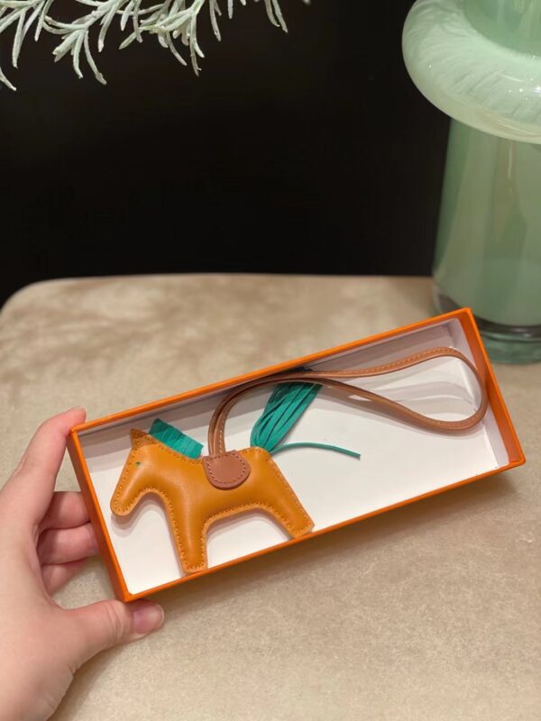 Hermes Rodeo PM Charm Milo Lambskin in Feu/Vert Jade/Alezan