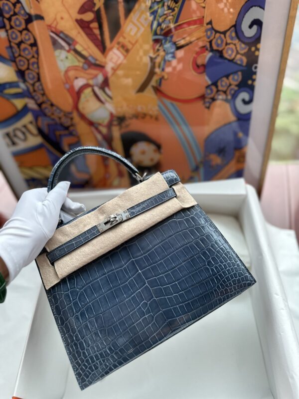 Kelly 25 in Denim Blue Shiny Nile Crococodile