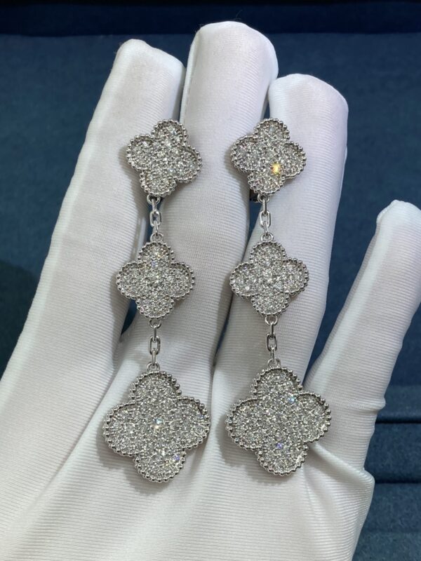 Van Cleef & Arpel Three-flowered four-leaf clover earrings, white gold