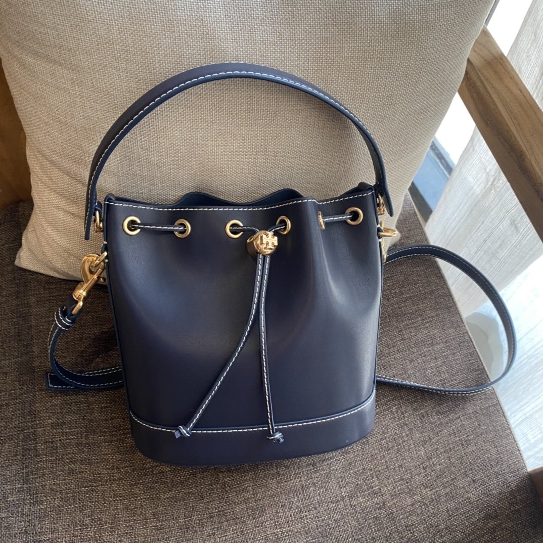 1000024624.jpg Tory Burch Monogram New Drawstring Bucket Bag - Image 1