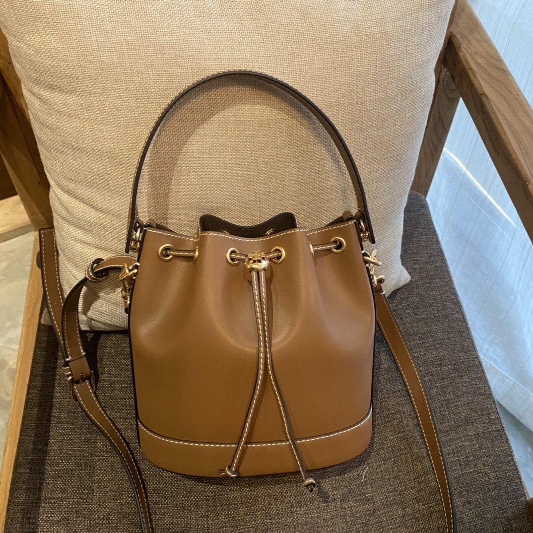 1000024632.jpg Tory Burch Monogram New Drawstring Bucket Bag - Image 1