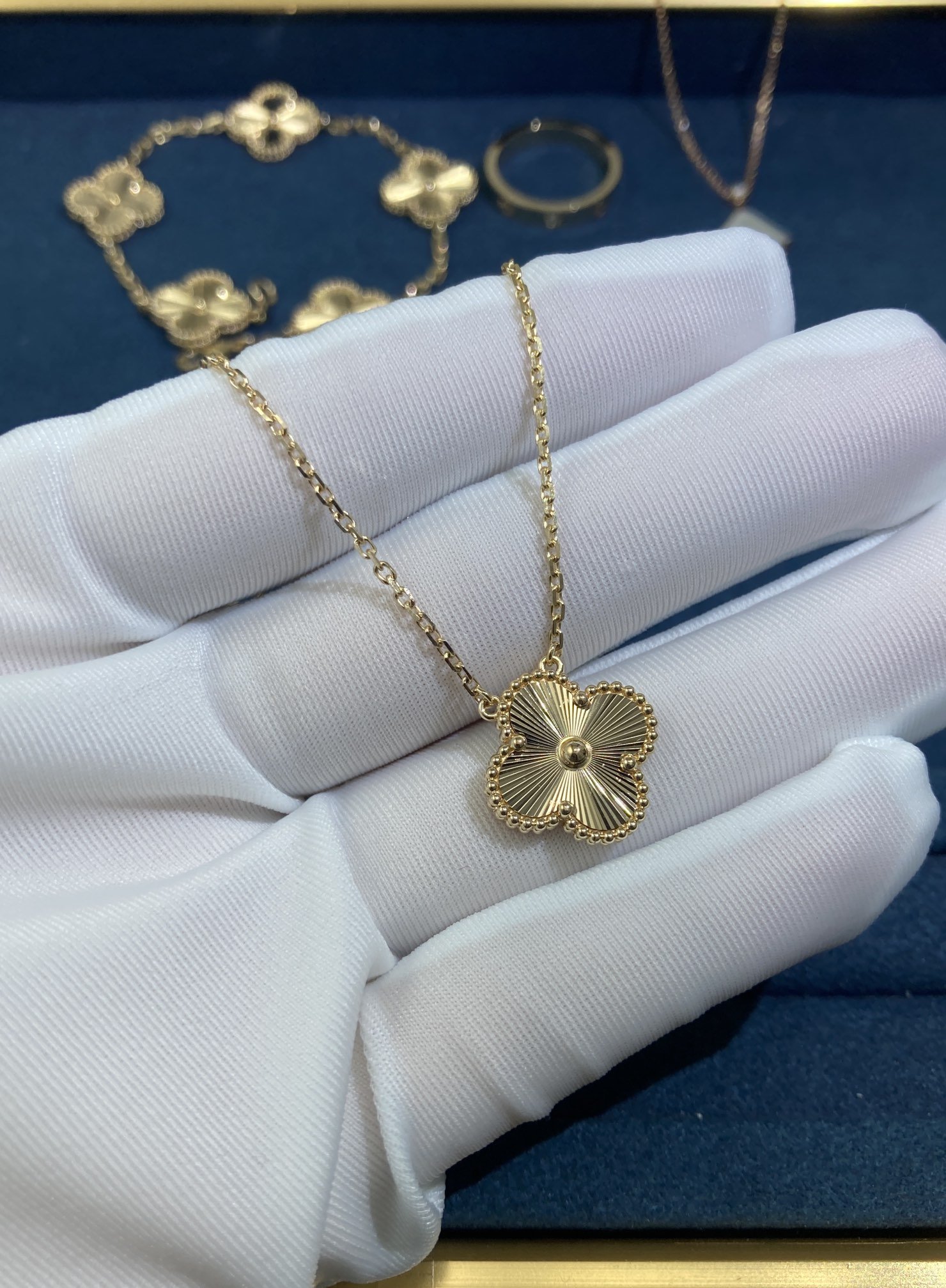 50129.jpg Medium Laser Clover Necklace, Yellow Gold - Image 1