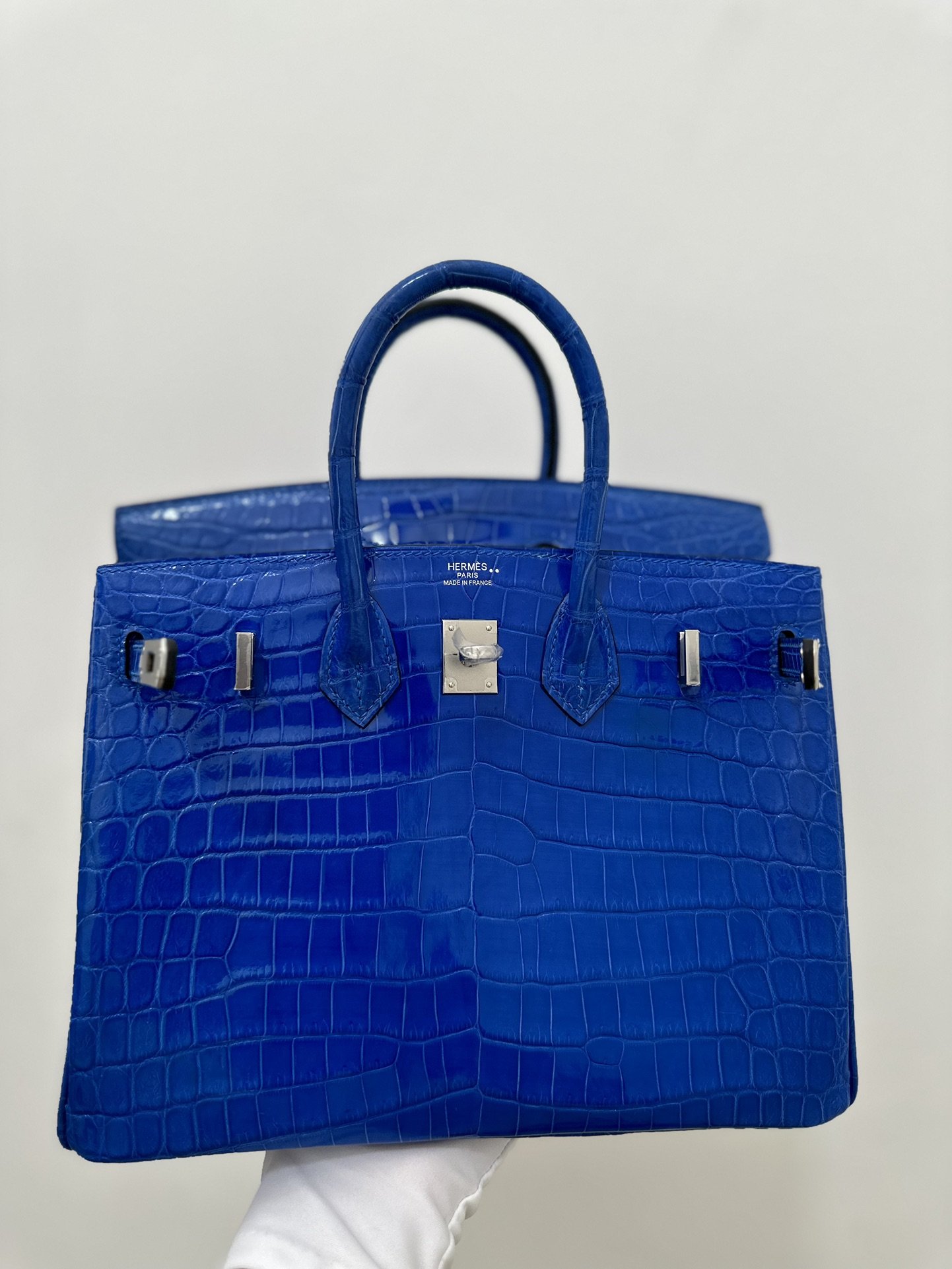 78140.jpg Birkin 25 Blue Shiny Crocodile PHW - Image 1