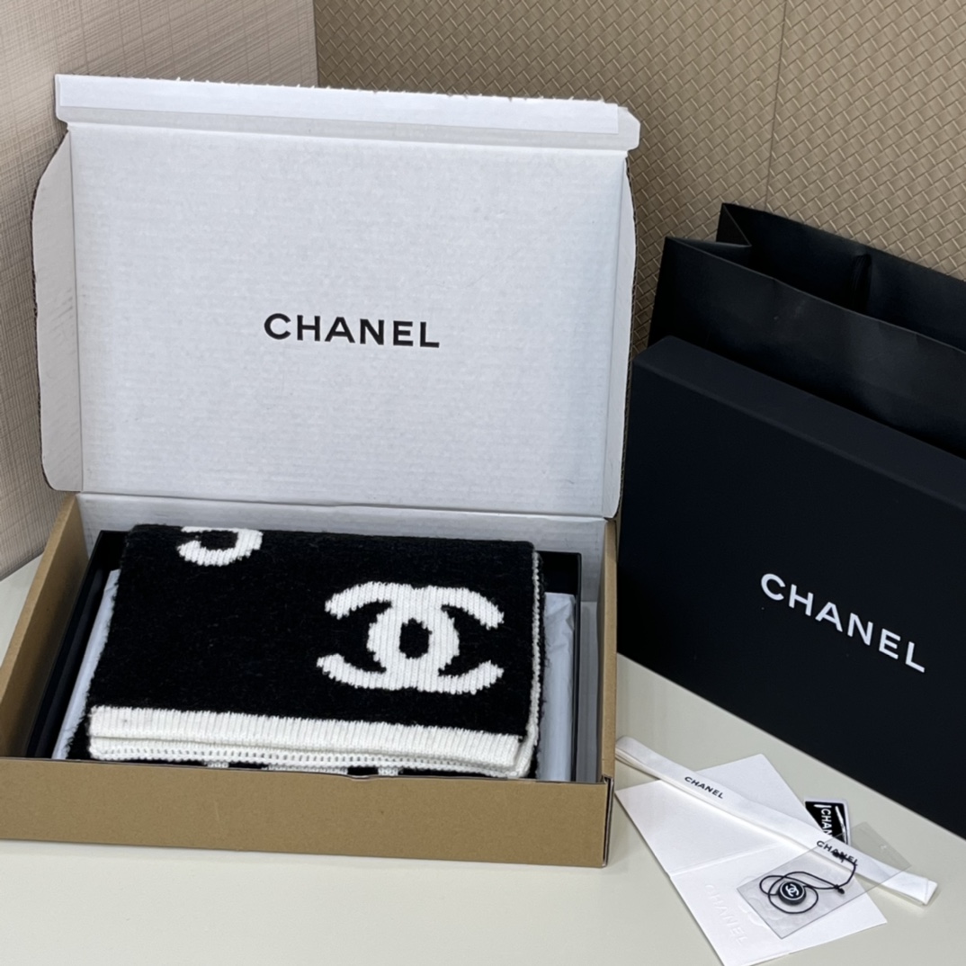8ffe13_34d8552965fd4a63a8061d153623f378mv2.jpg Chanel Alphabet Scarfs - Image 1