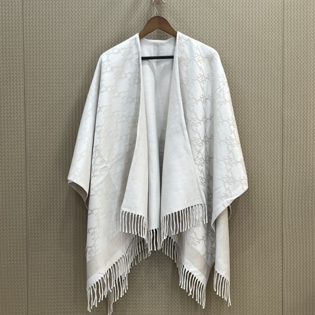 8ffe13_e394288b220c4e0aadae9caf813ff79cmv2.jpg Fendi Karl Cape - Image 1