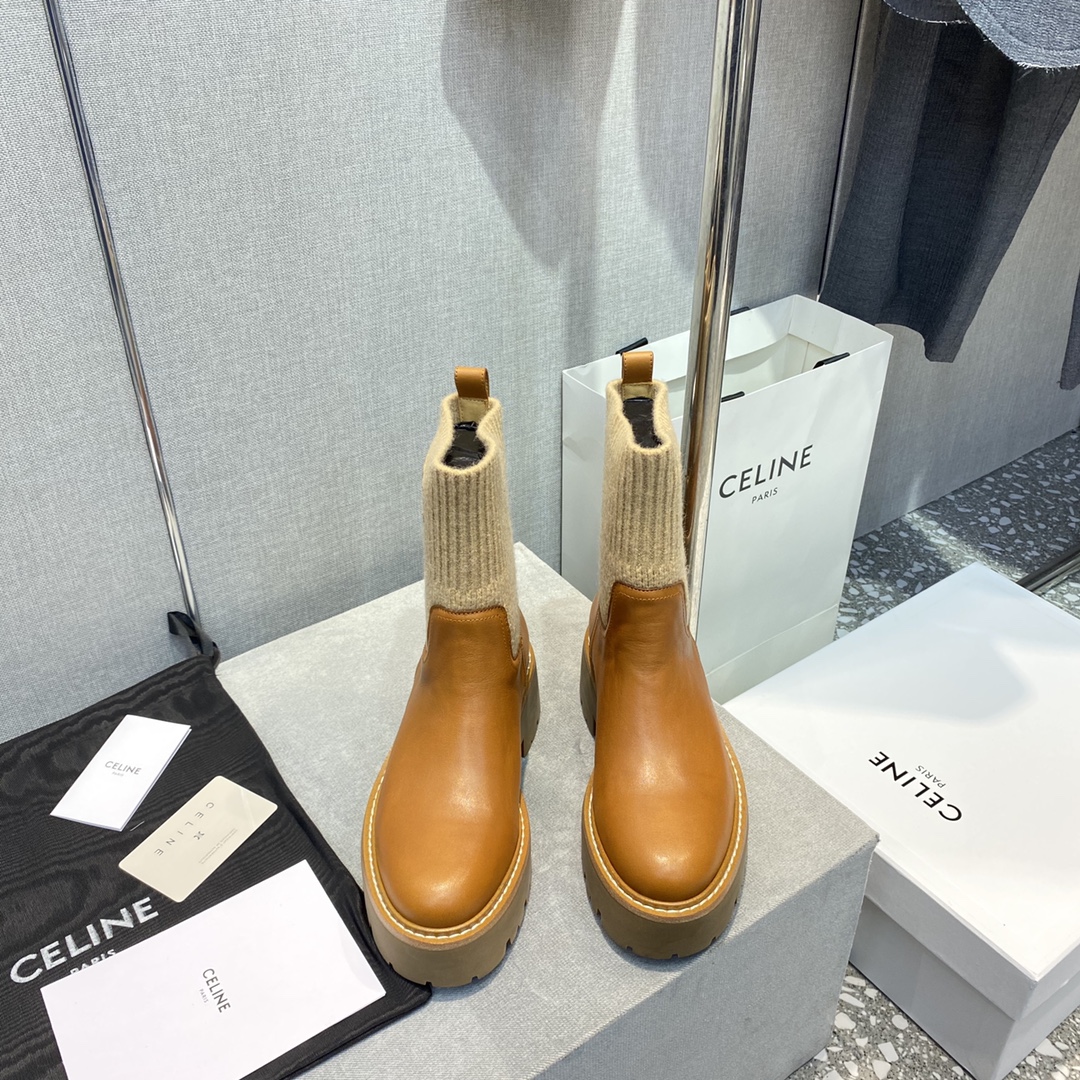 b3869c_75683c06c3ca461090f186a0070374d0mv2.jpg Celine Thick-soled Sock Boots - Image 1