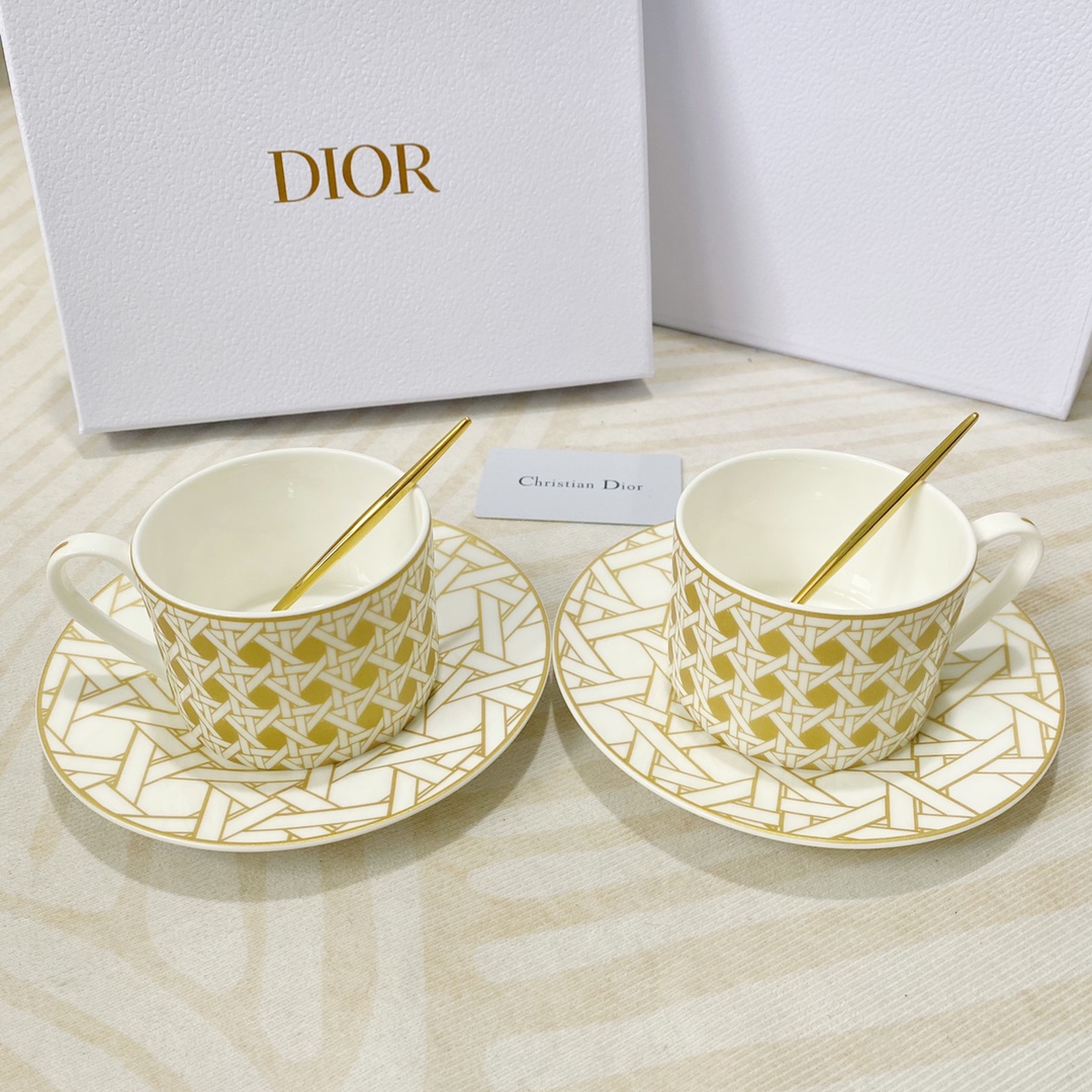 b3869c_7a354c0c40f54e688118cf8a894112ddmv2.jpg Dior Double Cup&Saucer Set - Image 1