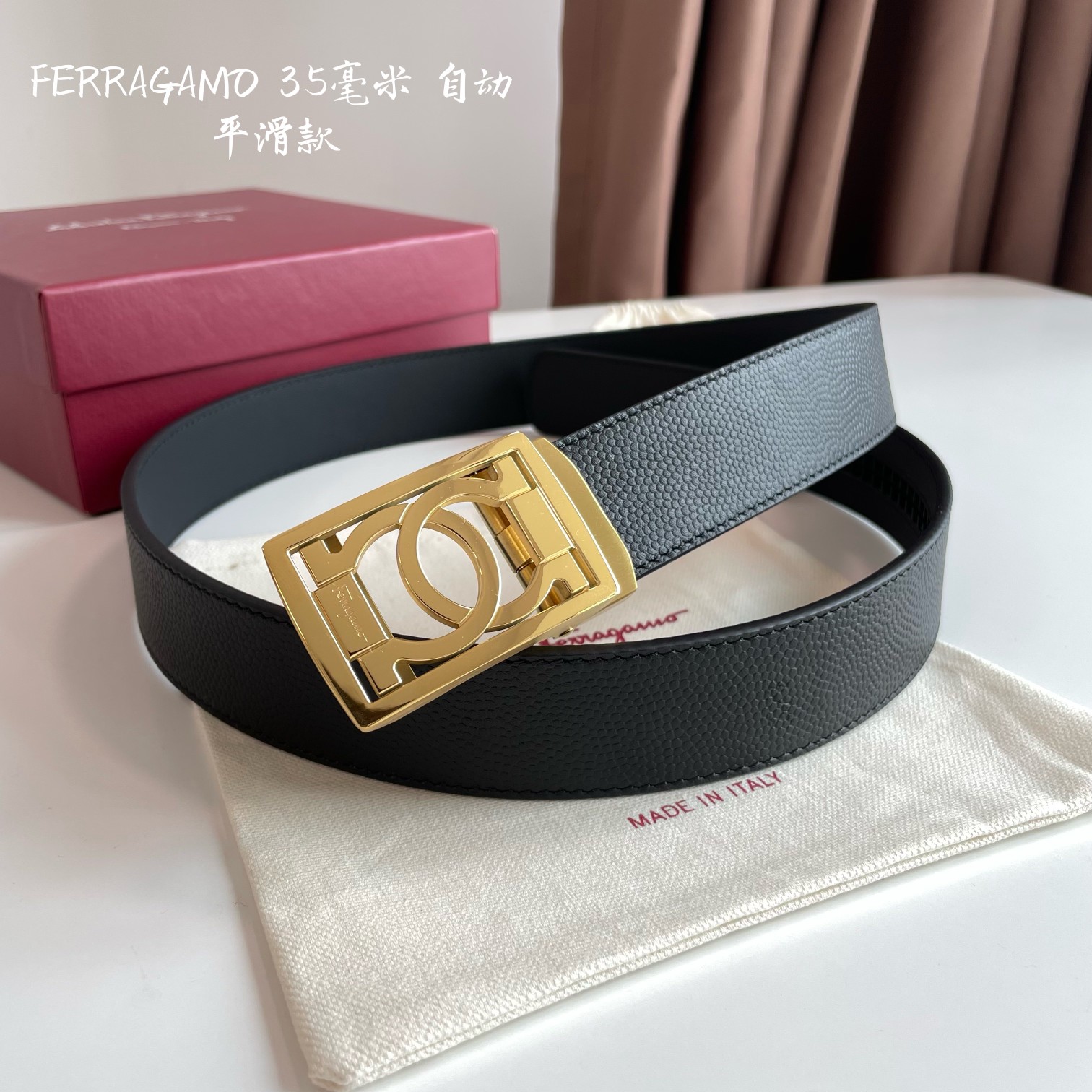 db9bf2_01297838d68d44419f9ca66ab8076fd3mv2.jpg Ferragamo Logo Buckle Automatic Smoothing Leather Belt - Image 1