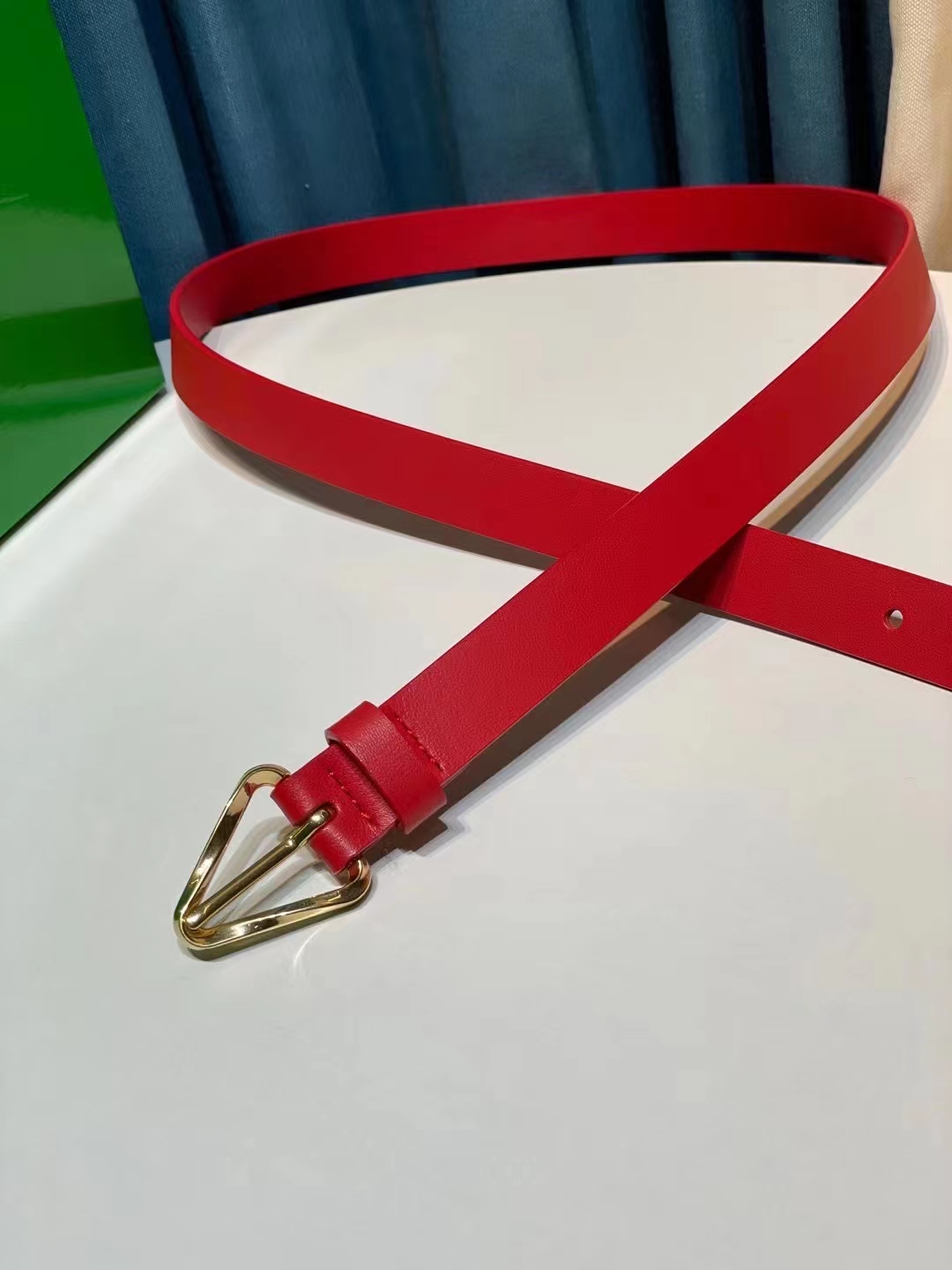 db9bf2_24359b0ae9d54a48997febd7fc2cb0ffmv2.jpg Bottega Veneta Triangular Buckle Leather Belt - Image 1