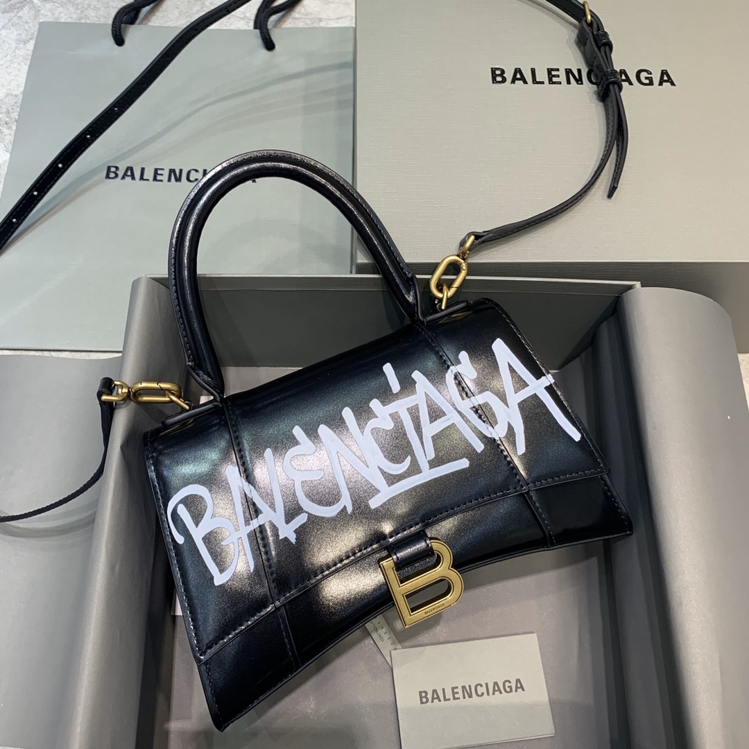 db9bf2_25a82df73559453380176e7cb19482e2mv2.jpg Balenciaga Small Graffiti Hourglass Bag in Black Crocodile Pattern - Image 1