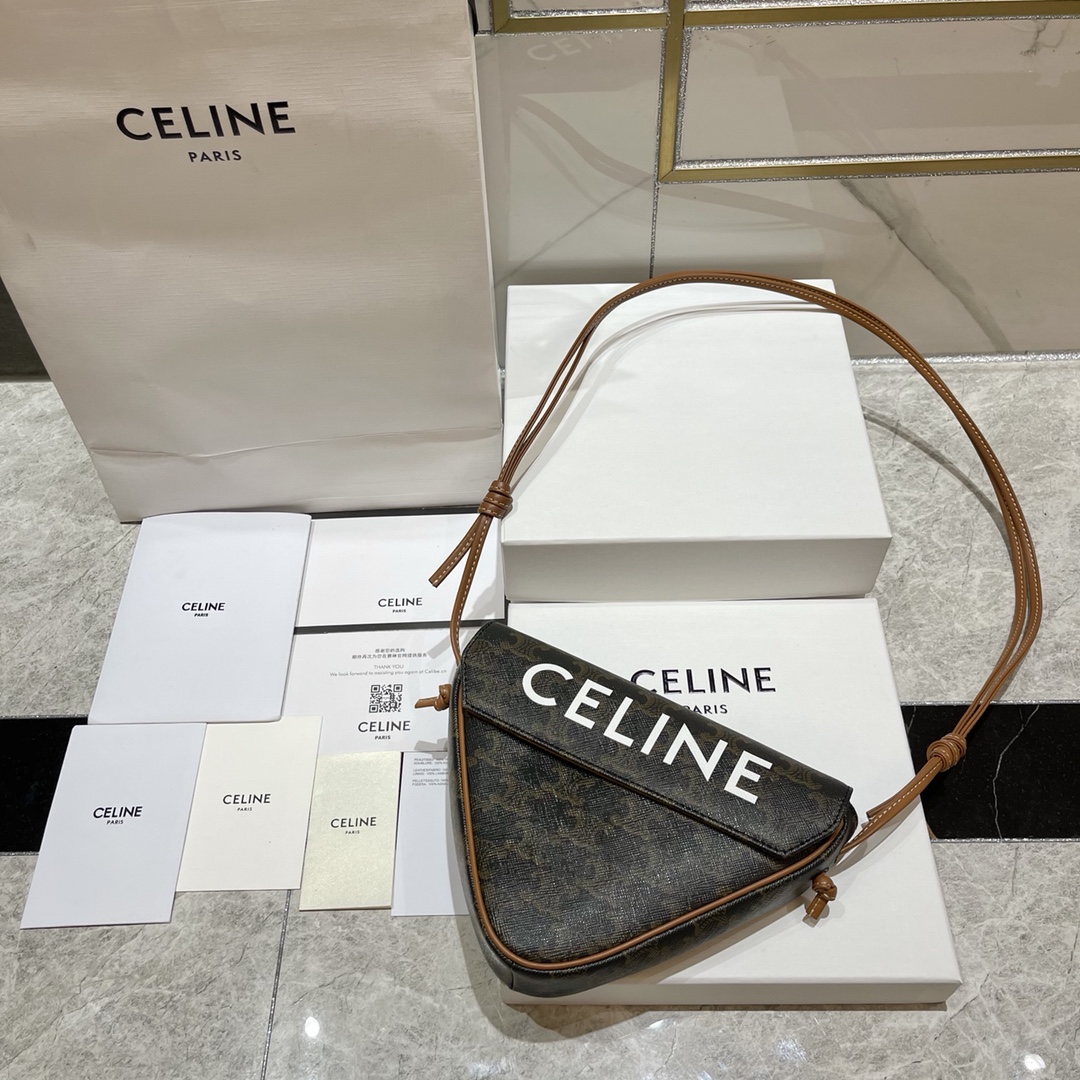 db9bf2_420a6020b5cd4619801be32eef59de18mv2.jpg Celine Triangular Bag - Image 1