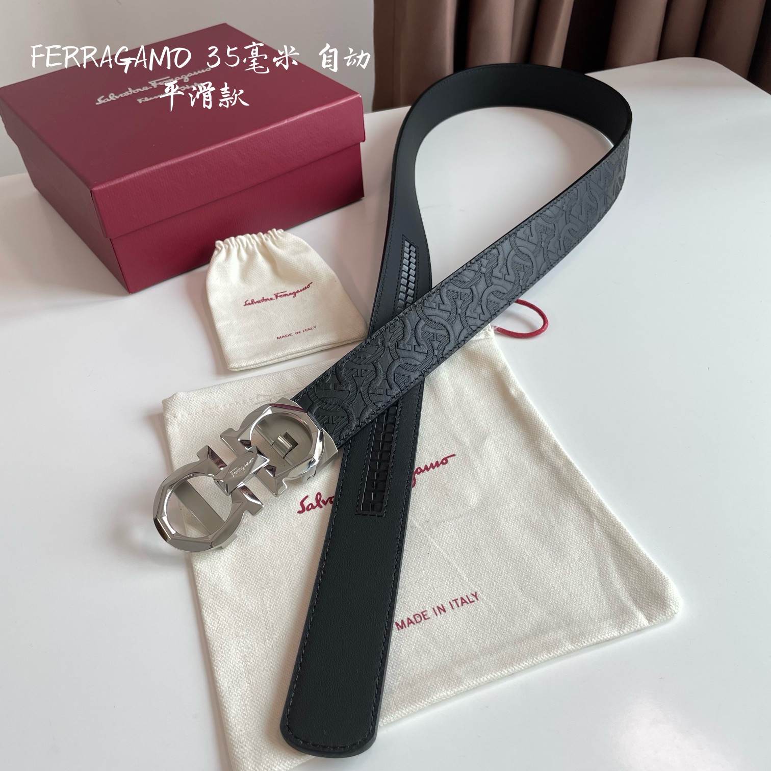 db9bf2_43eda0cb8aa04d329812697b25ede927mv2.jpg Ferragamo Logo Buckle Automatic Smoothing Leather Belt - Image 1