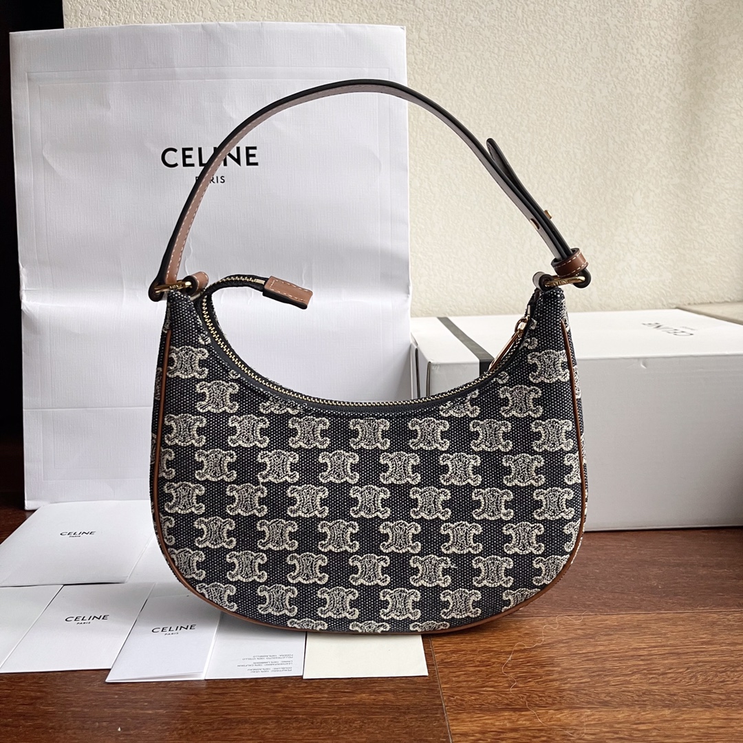 db9bf2_4505aa858497495da50533b66b5c6a8amv2.jpg Celine Denim Underarm Ava Strap Bag - Image 1