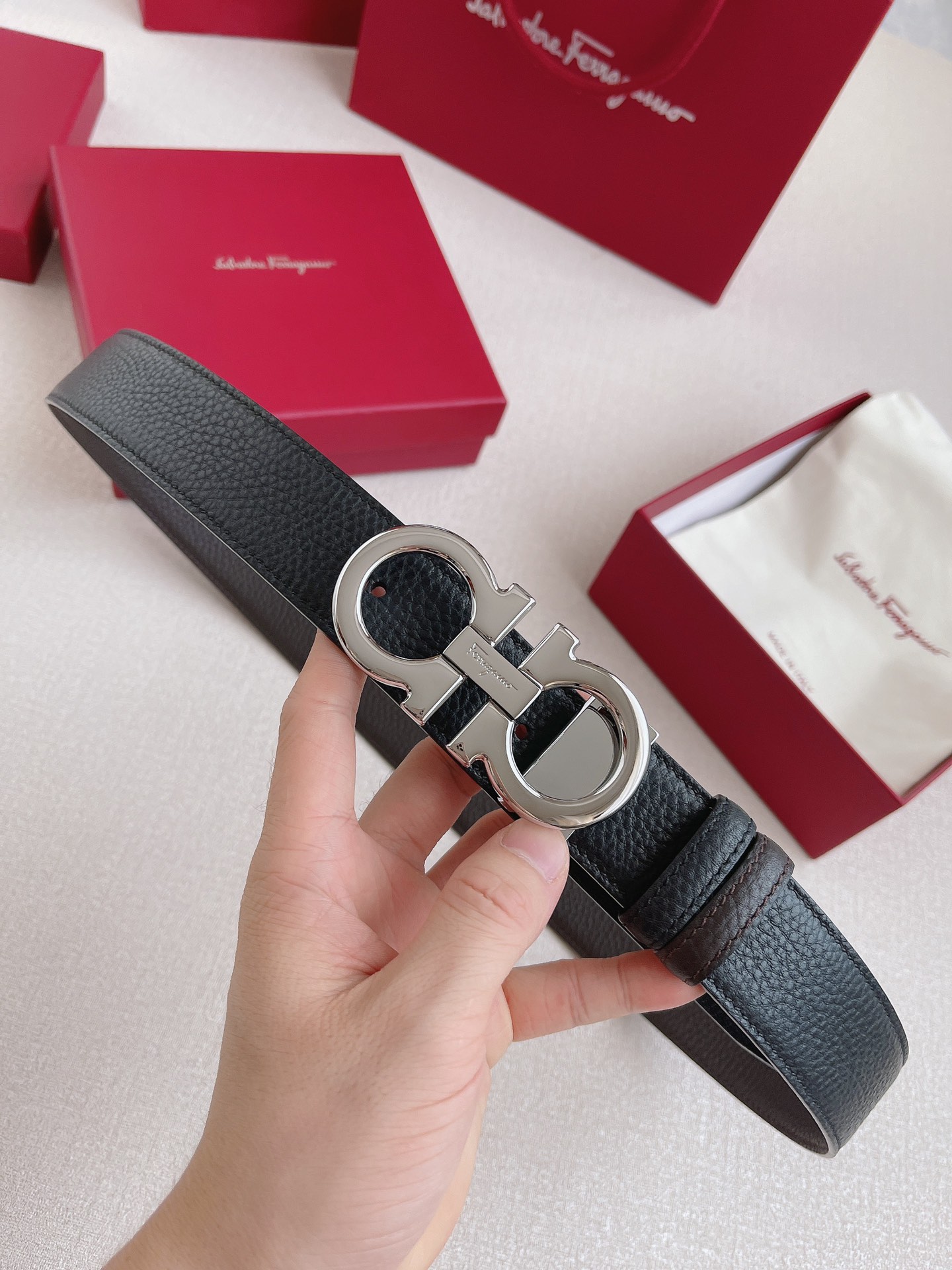 db9bf2_52488db9c4474c6fb5f68b531a6b2caamv2.jpg Ferragamo Logo Buckle Double-sided Leather Belt - Image 1