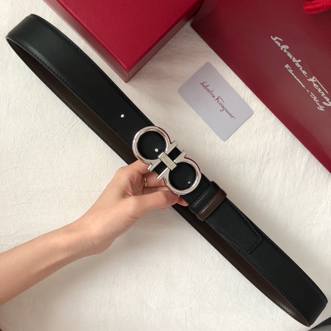 db9bf2_53a0c4a8a21049c19b6bbd65a0706235mv2.jpg Ferragamo Logo Buckle Leather Belt - Image 1