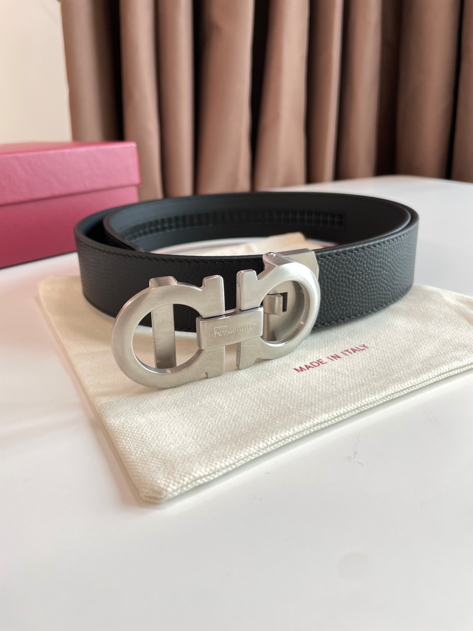 db9bf2_578931d5ab474a6988d1e67a93c4d92bmv2.jpg Ferragamo Adjustable Gancini Leather Belt - Image 1
