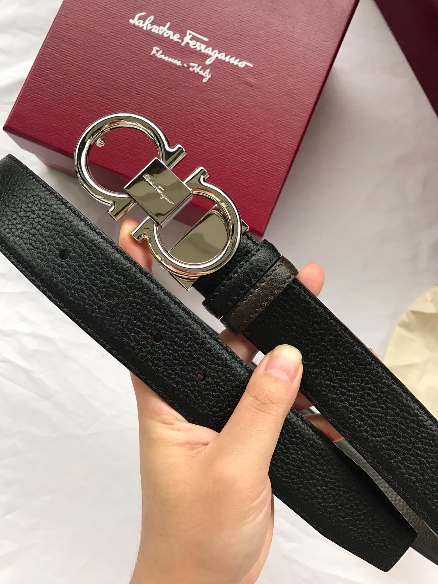 db9bf2_5e81436ee7af48a3922c3c8de1a2d77dmv2.jpg Ferragamo Logo Buckle Leather Belt - Image 1