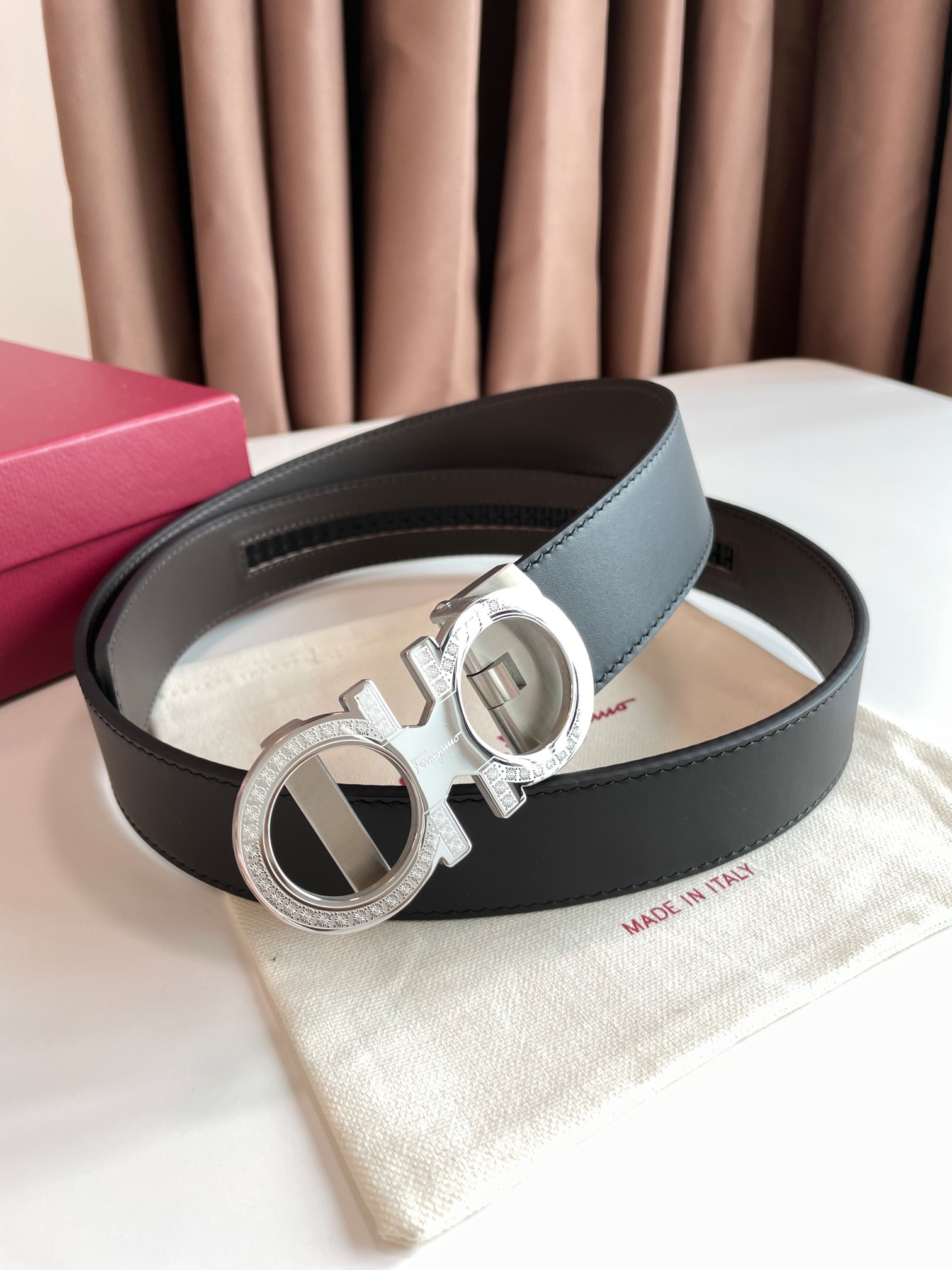 db9bf2_6060ee4457ef4ca4b98ce096641b2389mv2.jpg Ferragamo Adjustable Gancini Leather Belt - Image 1