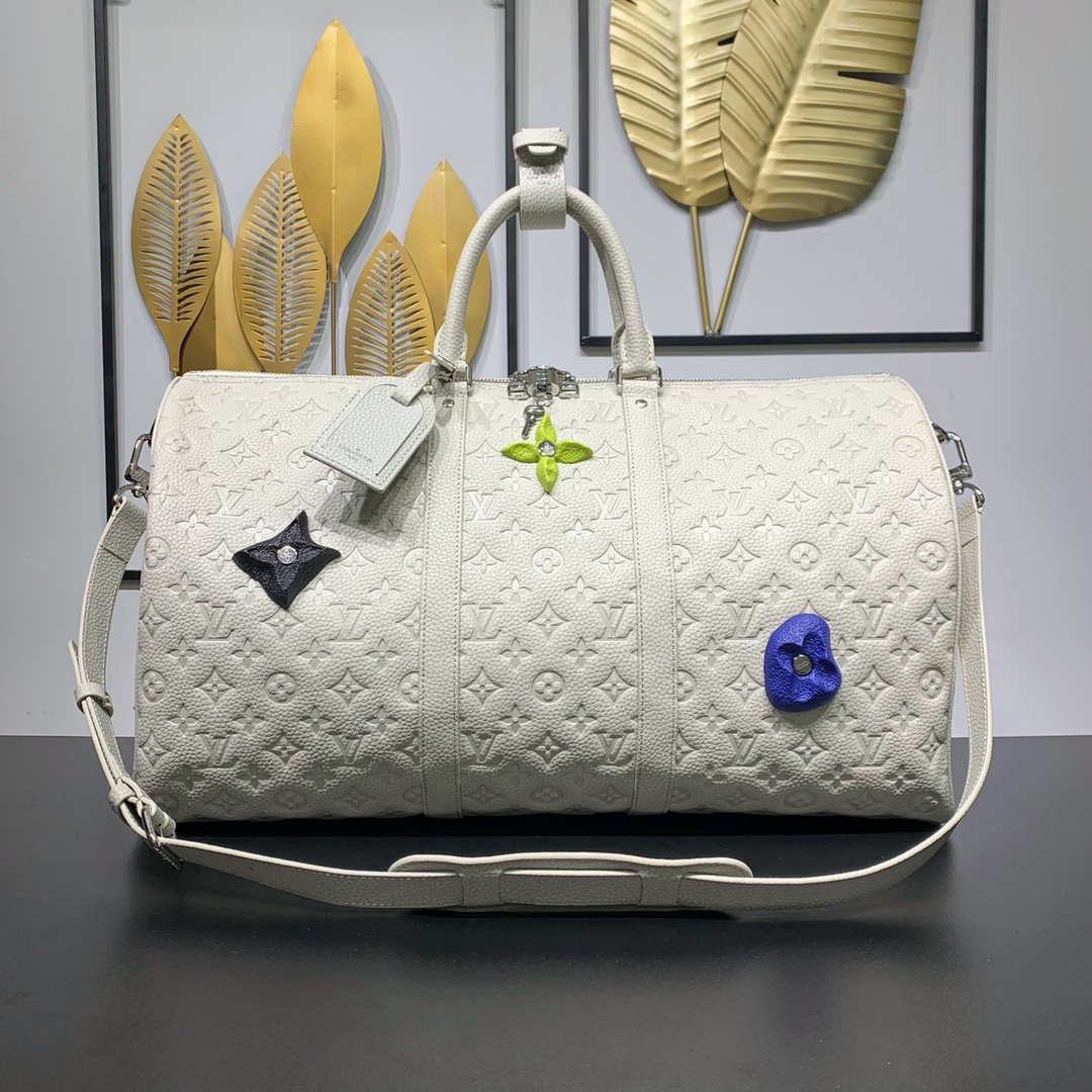 db9bf2_62e168c91aeb48eba6aaf75925a3f5edmv2.jpg Louis Vuitton Bag - Image 1