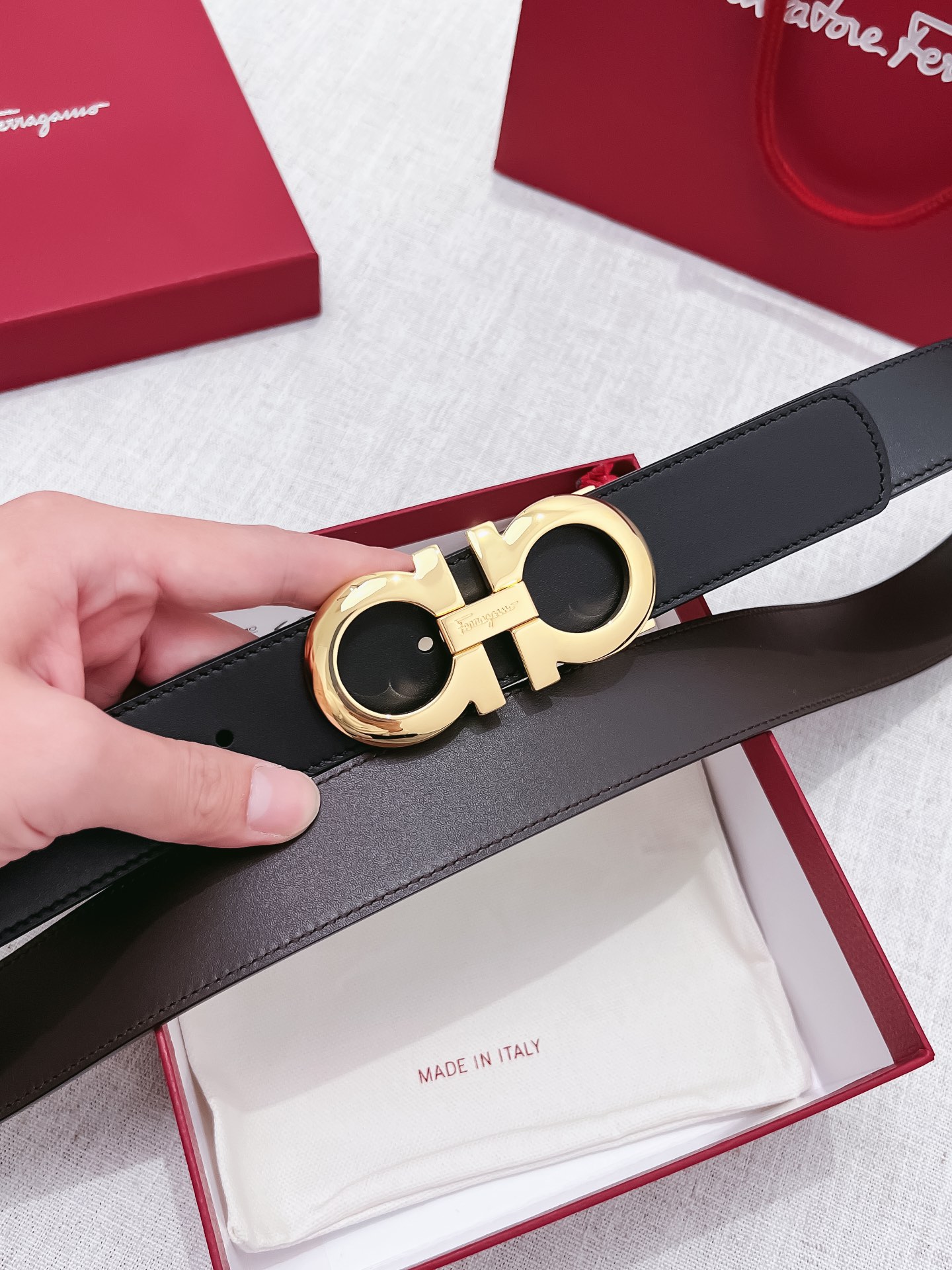 db9bf2_65c64da99ca34ac290d3f5dd10ac665fmv2.jpg Ferragamo Logo Buckle Leather Belt - Image 1