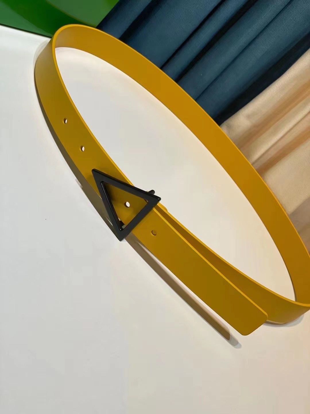 db9bf2_85c15e7748344dd9afee439747753bd9mv2.jpg Bottega Veneta Triangular Buckle Leather Belt - Image 1