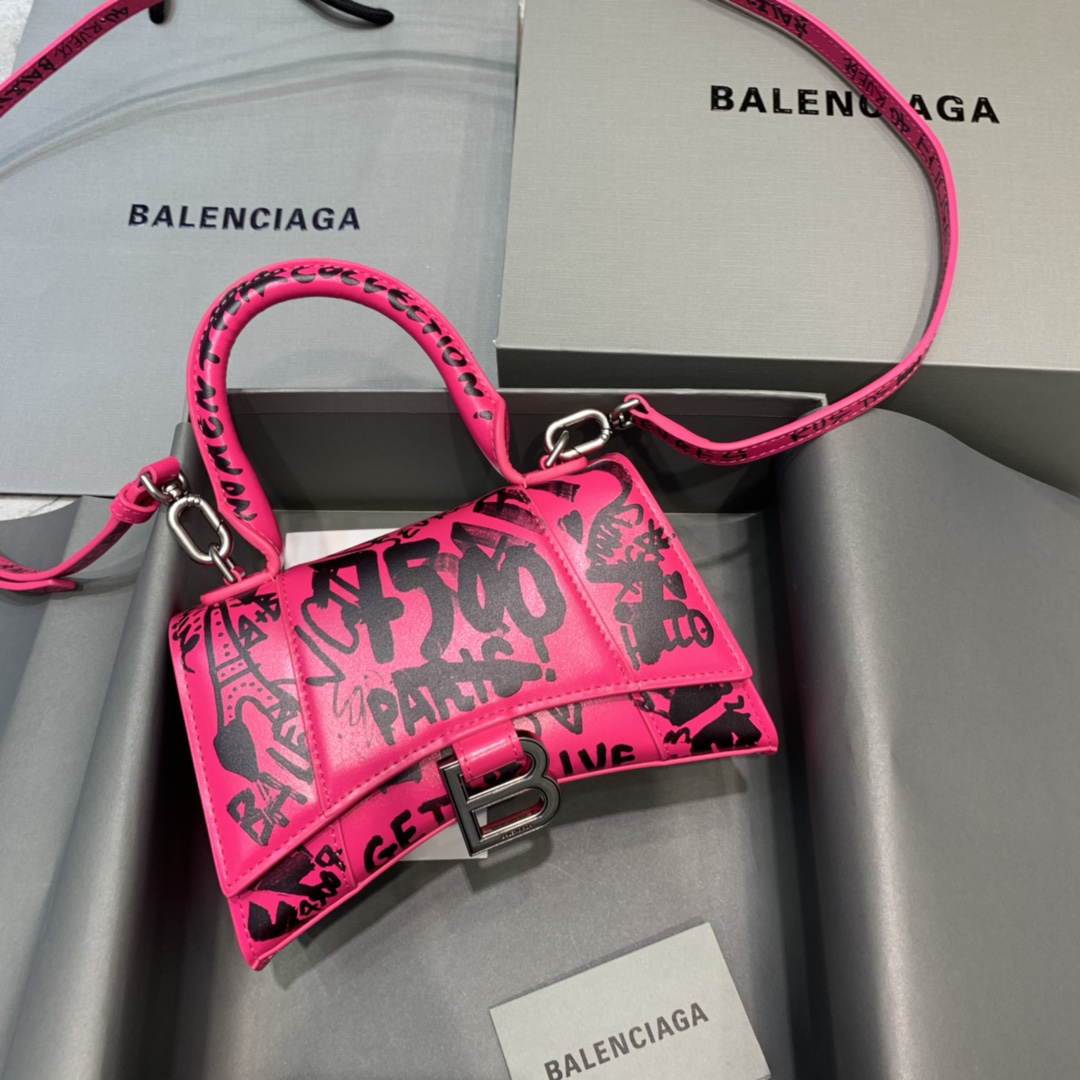 db9bf2_8be916e29b8f43dba9cce4c2b8b6487cmv2.jpg Balenciaga Mini Hourglass Bag in Graffiti Rose - Image 1