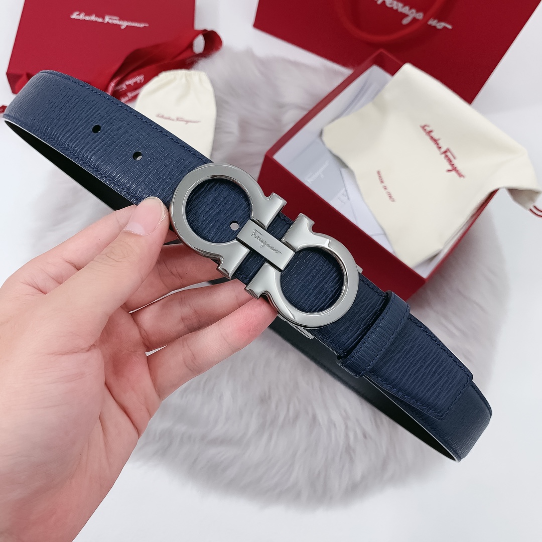 db9bf2_8c6fa3e147f641d7a99d37017f45afc8mv2.jpg Ferragamo Logo Buckle Leather Belt - Image 1