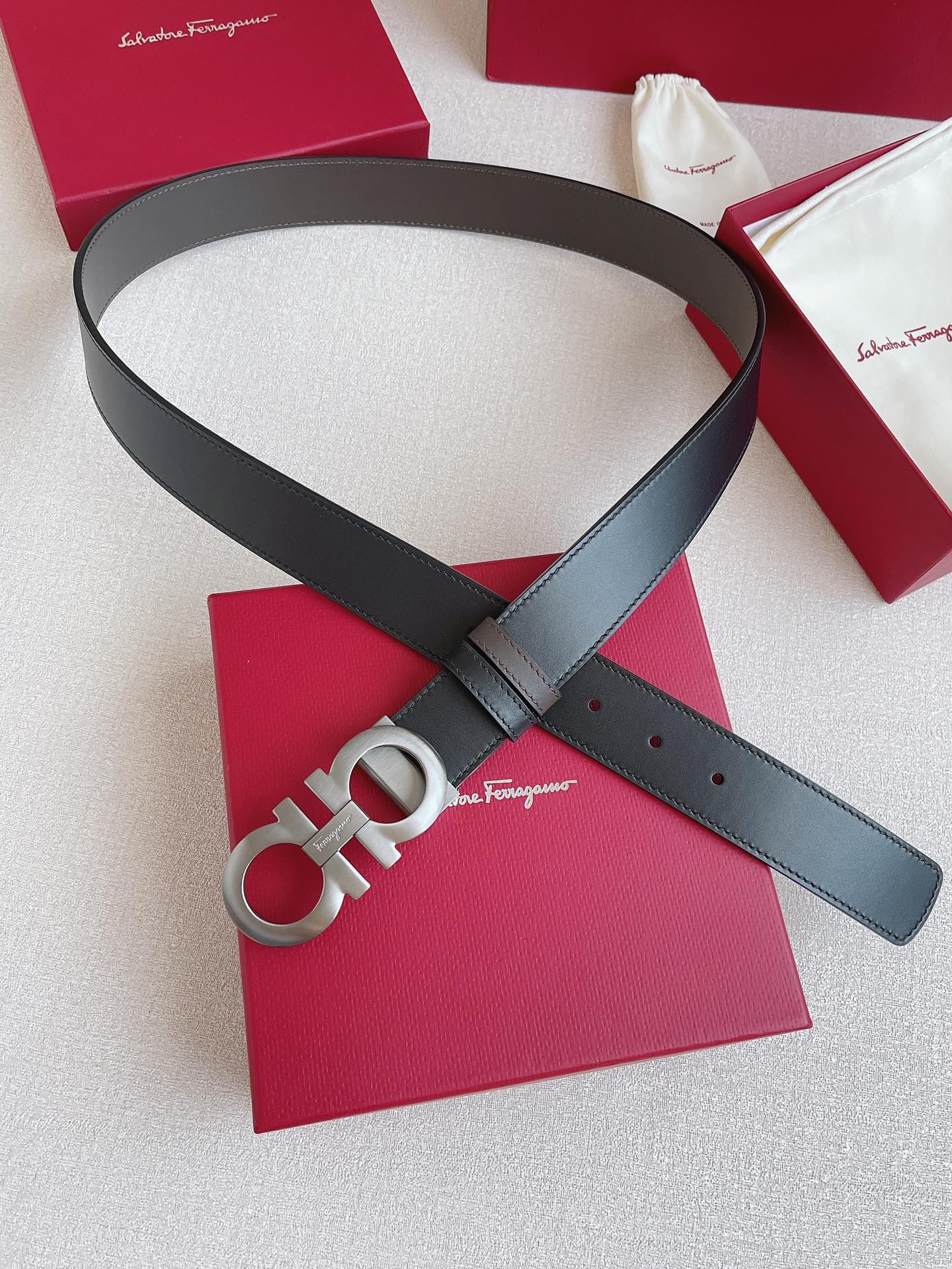 db9bf2_9b89e57fd81142fb8b51e23a68ebb91cmv2.jpg Ferragamo Gancini Buckle Leather Belt - Image 1