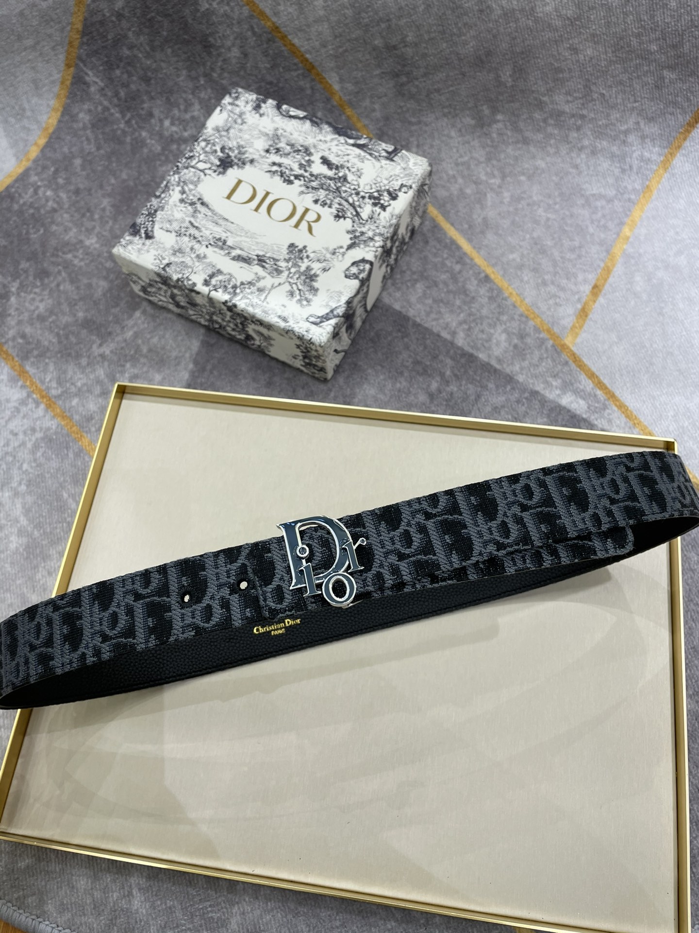 db9bf2_a1f3c8eec3164a31b65915ce5ddabcb2mv2.jpg Dior Leather Belt - Image 1