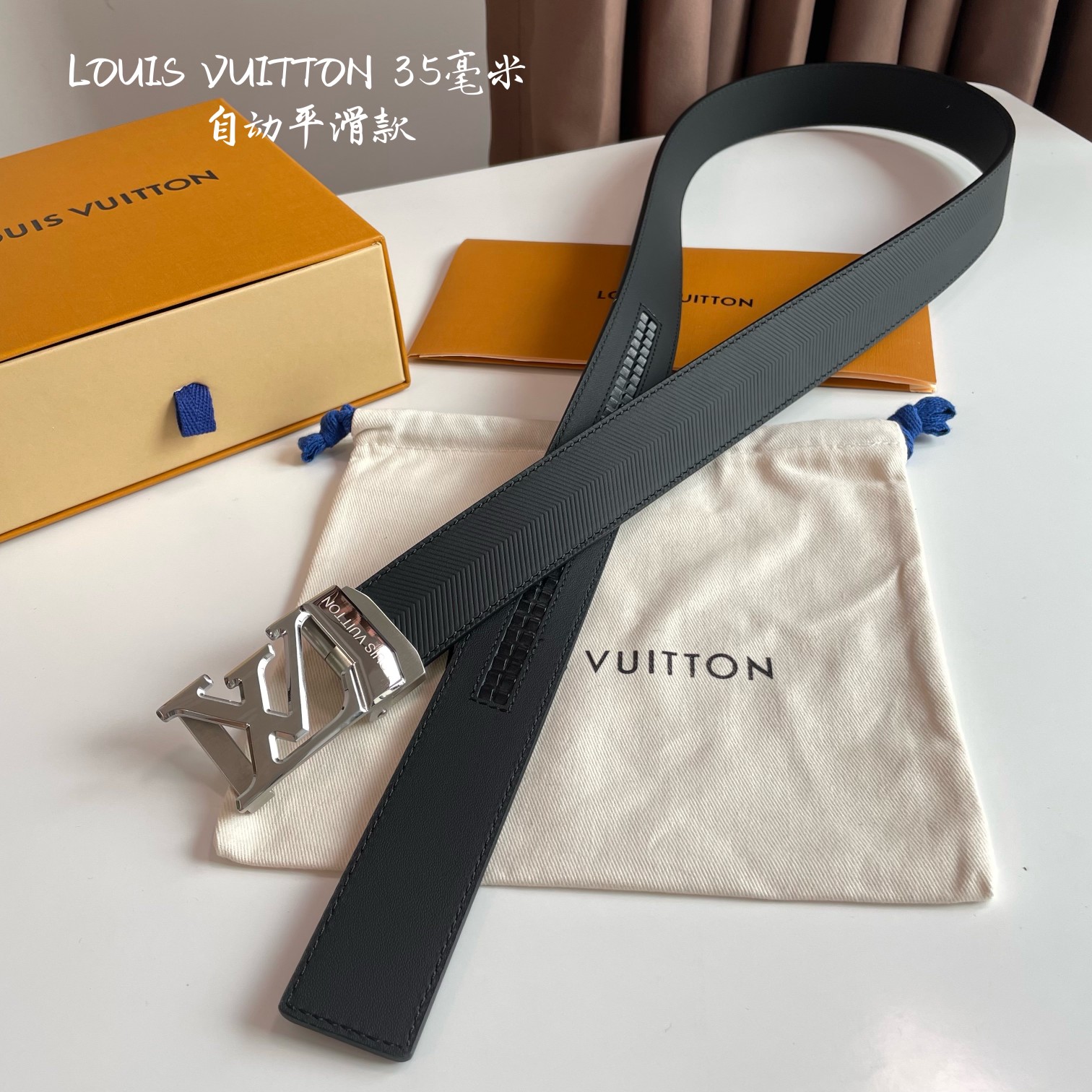 db9bf2_a3cabb2767ee4a69b52ecd175c81cc1fmv2.jpg Louis Vuitton Logo Buckle Automatic Smoothing Leather Belt - Image 1