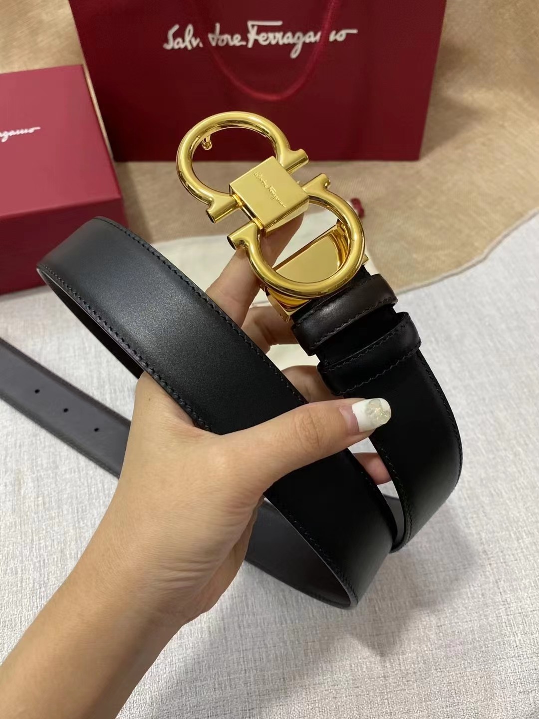 db9bf2_a7c5455aa27747d09ba7b1299dc81217mv2.jpg Ferragamo Gancini Buckle Leather Belt - Image 1