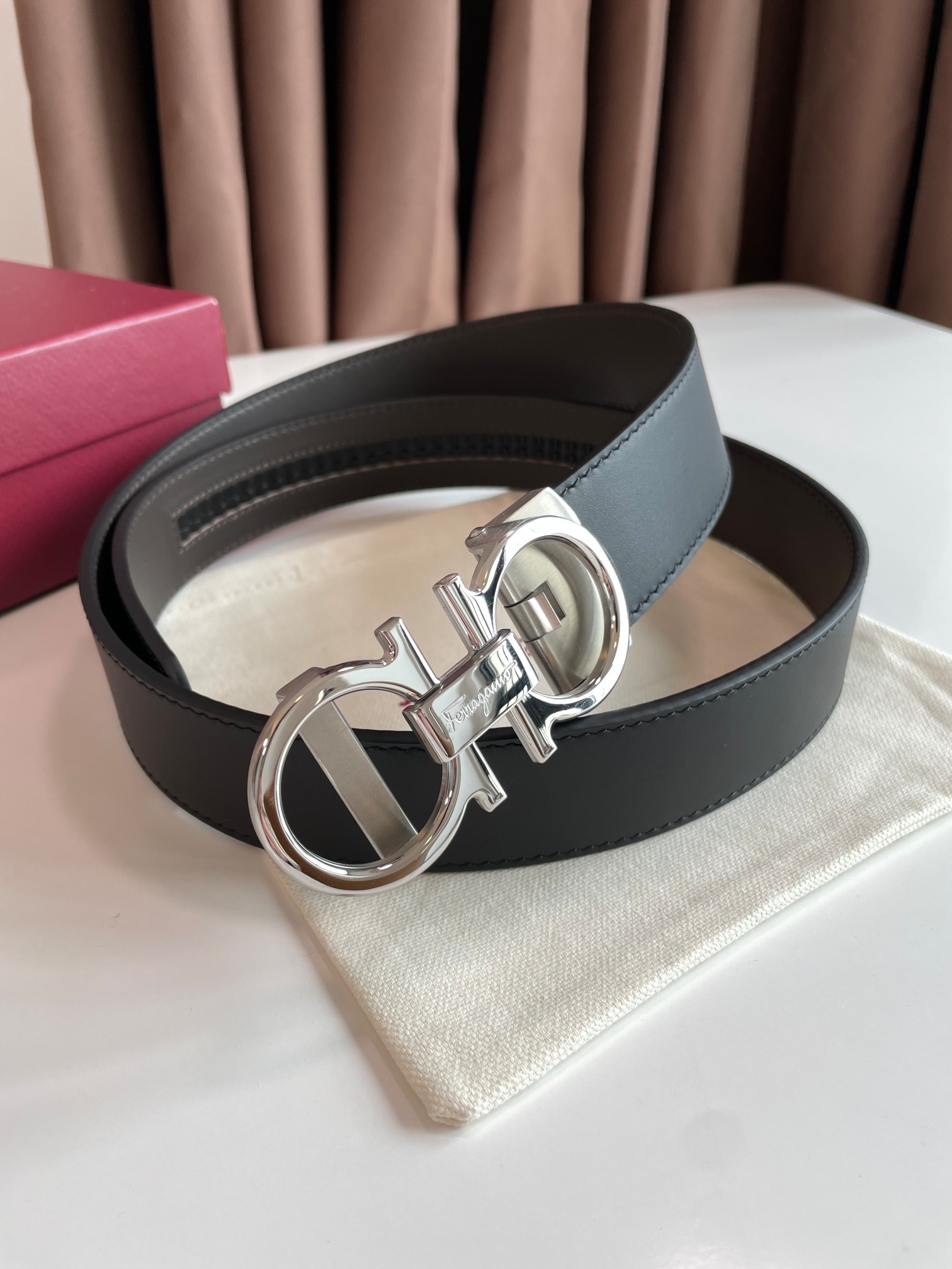 db9bf2_a7fc9488cccf44c2a369310a3946af5amv2.jpg Ferragamo Adjustable Gancini Leather Belt - Image 1