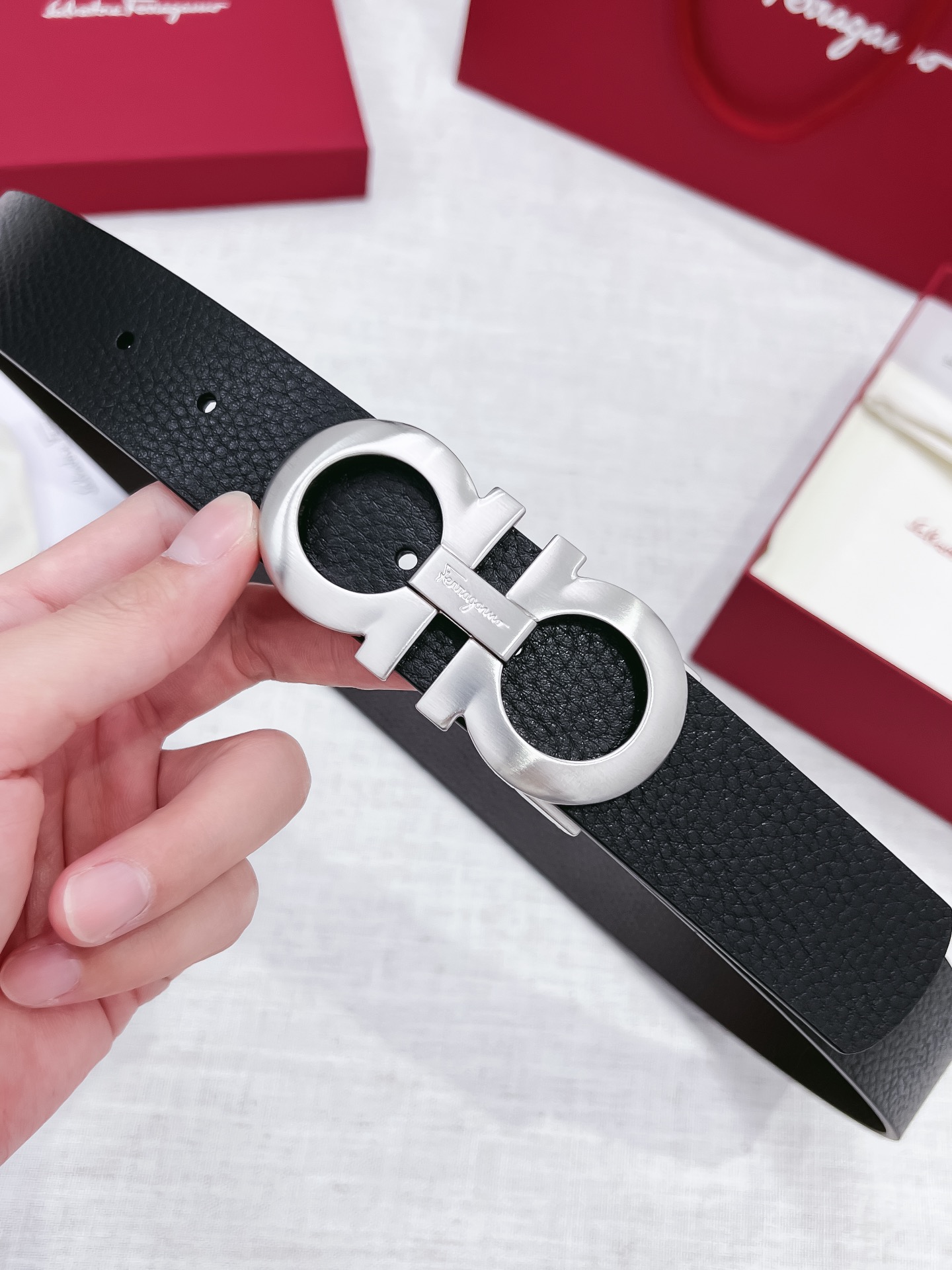 db9bf2_b46c37159fc54b949eb4e6c0a0445a0cmv2.jpg Ferragamo Logo Buckle Leather Belt - Image 1