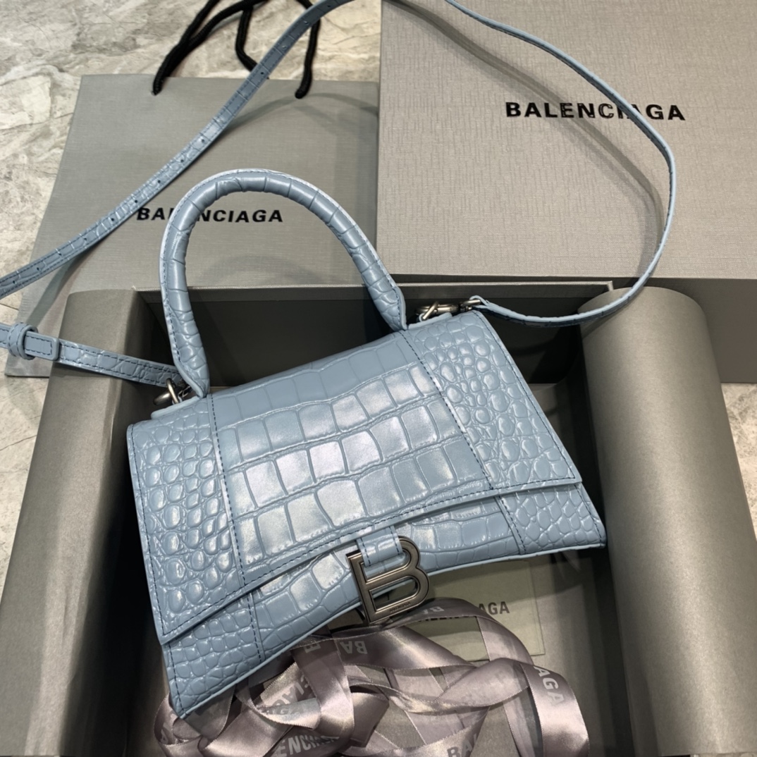 db9bf2_b63489d32d88459b9a7ba882285994d6mv2.jpg Balenciaga Small Hourglass Bag in Haze Blue Crocodile Pattern - Image 1