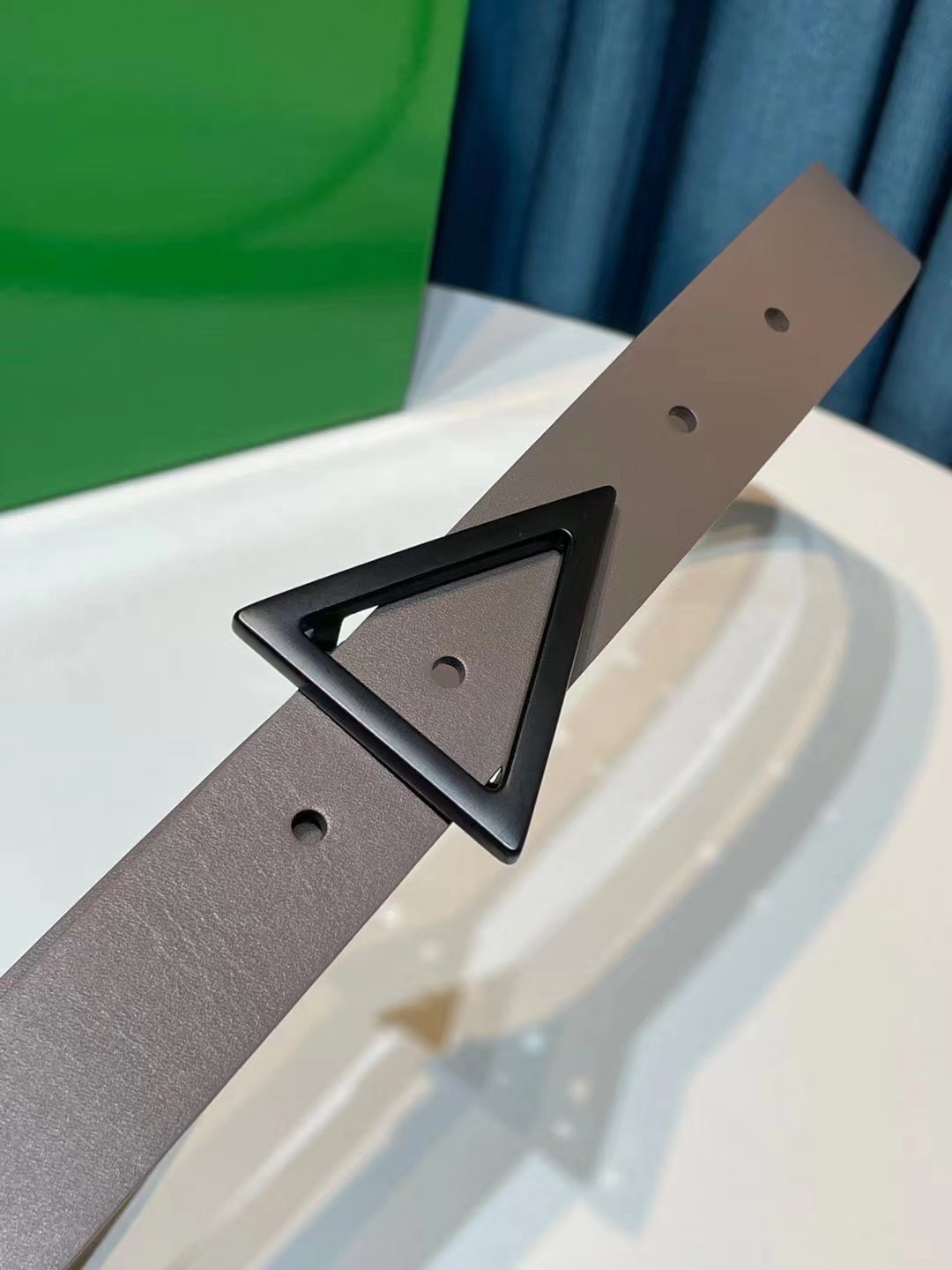 db9bf2_bd6c8bc267e54deeac956090b46f5329mv2.jpg Bottega Veneta Triangular Buckle Leather Belt - Image 1