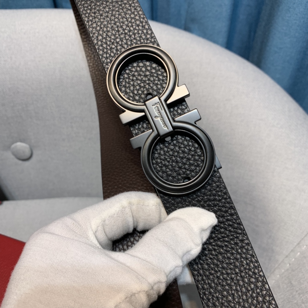 db9bf2_c8acd15831f6466e9d928e275a0b1748mv2.jpg Ferragamo Logo Buckle Leather Belt - Image 1
