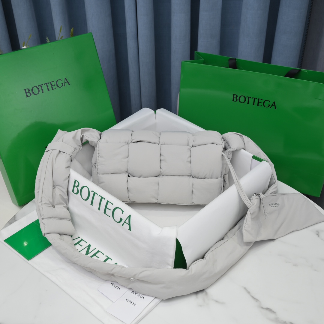 Bottega Veneta Padded Tech Cassette Bag in White - Image 4