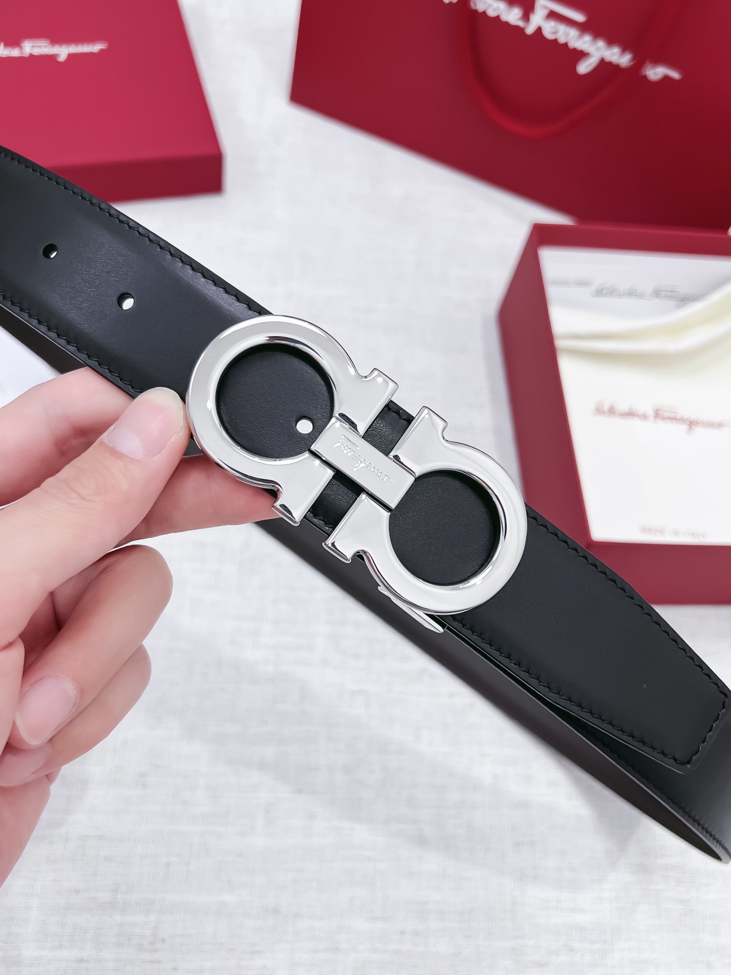 db9bf2_dd6cdb47f62b4fe49e4e9c2dfb9d3396mv2.jpg Ferragamo Logo Buckle Leather Belt - Image 1