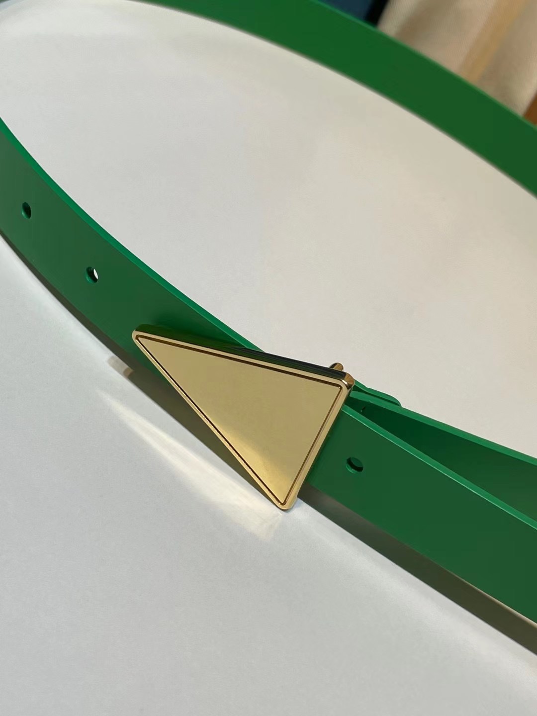 db9bf2_de75929415234b76b07af2b6859b13a1mv2.jpg Bottega Veneta Triangular Buckle Leather Belt - Image 1