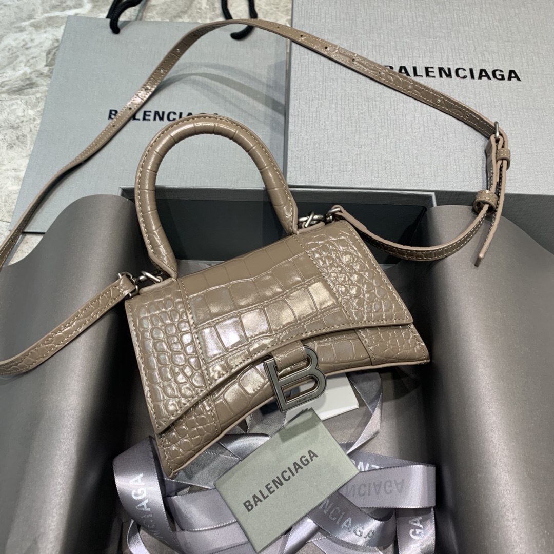 db9bf2_e2aeb0ce213d4a7d9acbebefe80bbc57mv2.jpg Balenciaga Mini Hourglass Bag in Milk Tea Crocodile Pattern - Image 1