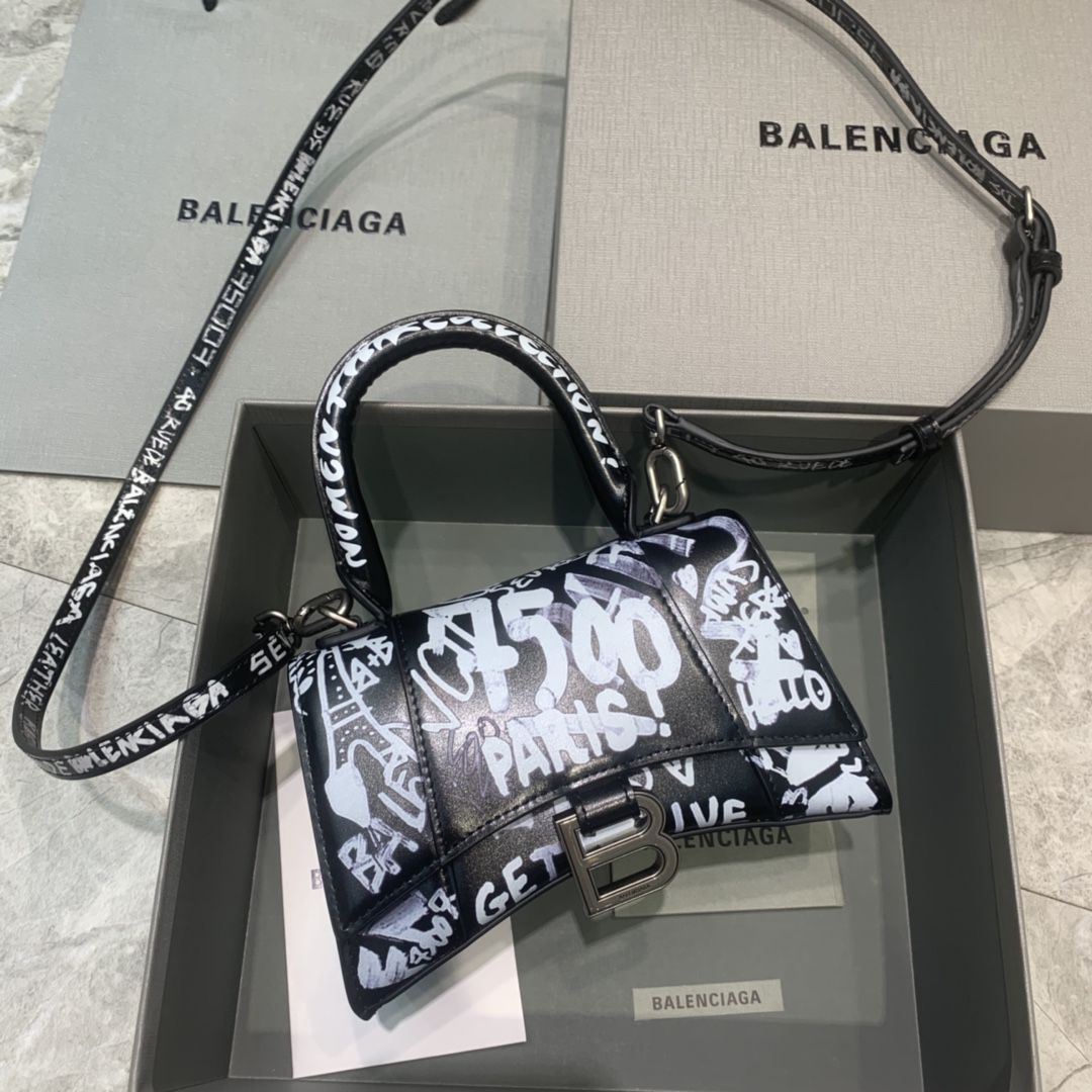 db9bf2_f33f77bbf6cd493894843cc448ad366emv2.jpg Balenciaga Mini Hourglass Bag in Graffiti Black - Image 1