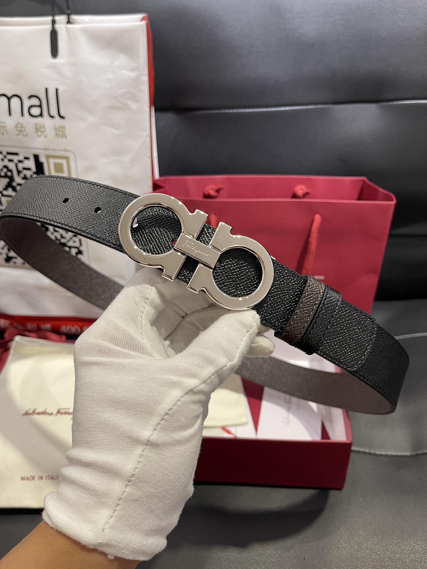 db9bf2_f507ceec28064f428b2c0adcf22fb651mv2.jpg Ferragamo Adjustable Gancini Leather Belt - Image 1