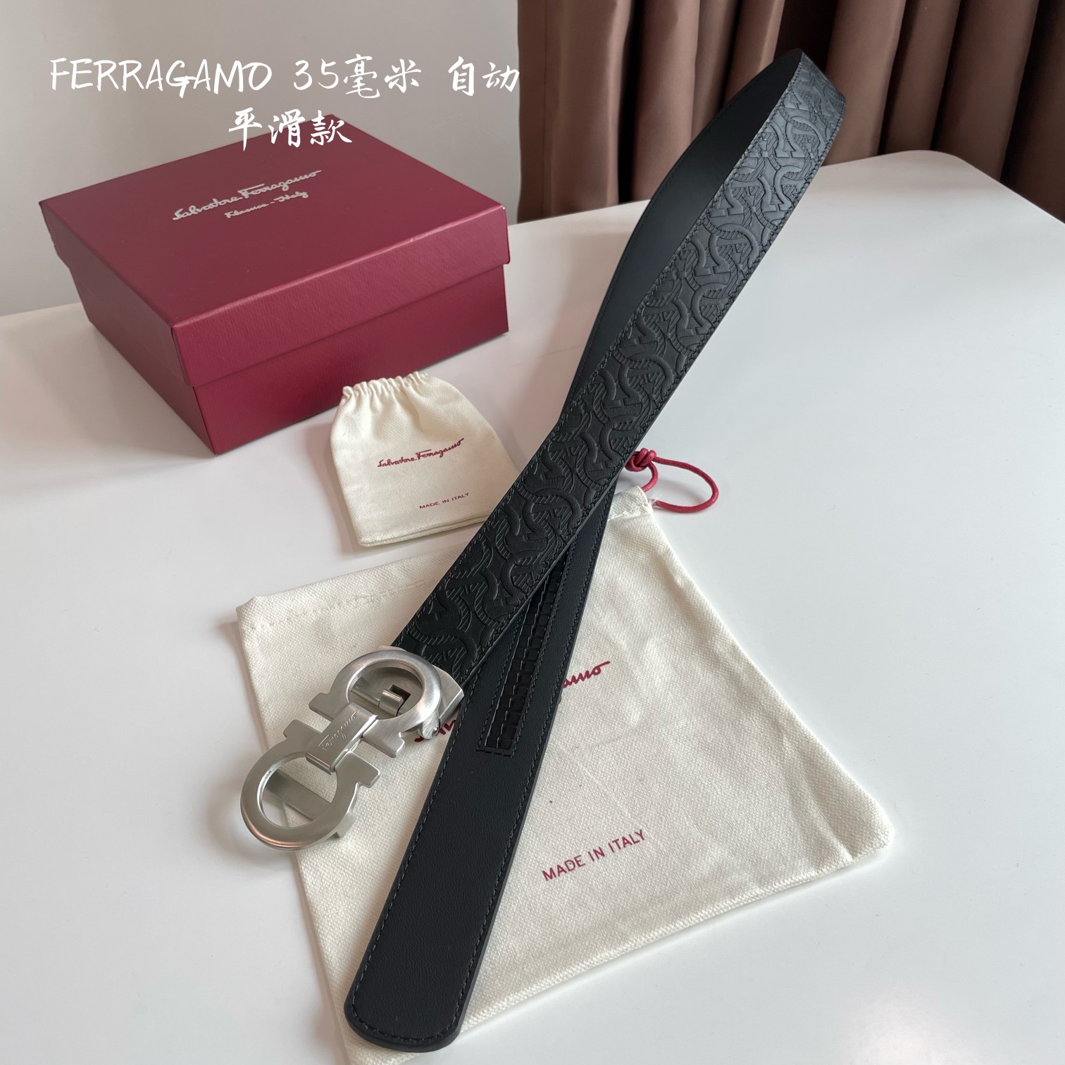 db9bf2_fa37e908717c4e20949f8cfc95f0d067mv2.jpg Ferragamo Logo Buckle Automatic Smoothing Leather Belt - Image 1