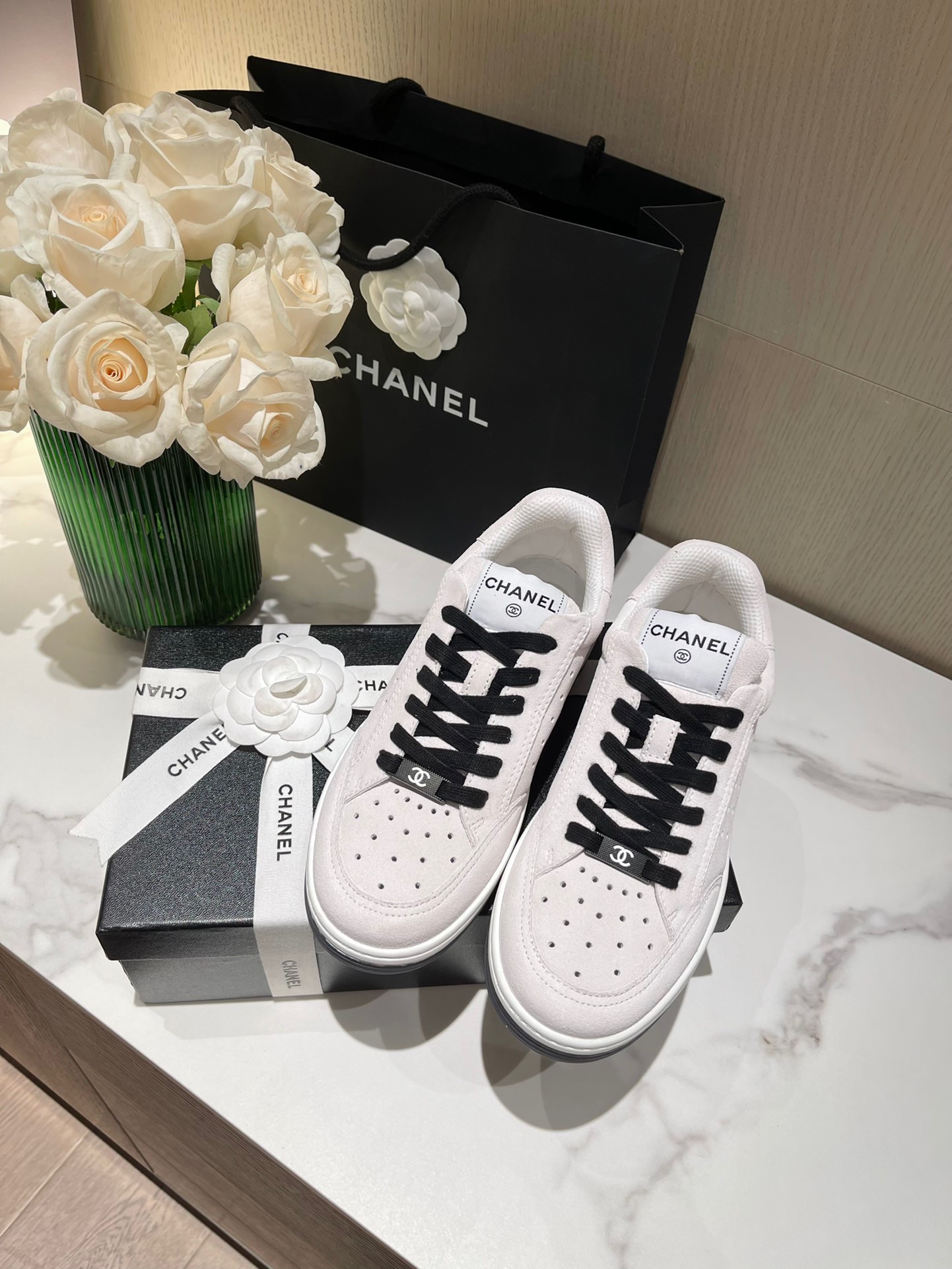 fb638e_026b61674bd443b38e96aca6ff567caemv2.jpg Chanel Sneakers - Image 1