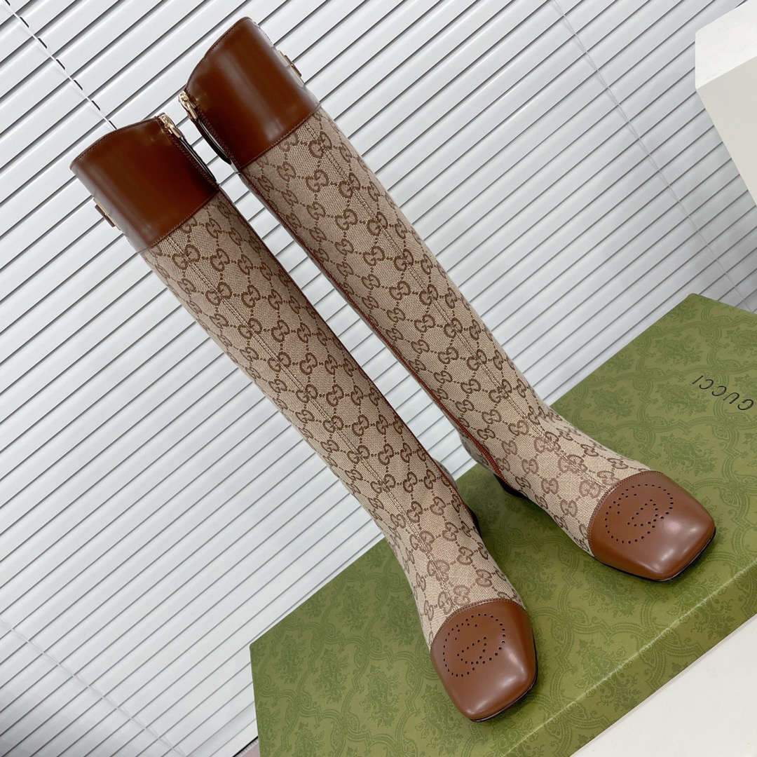 fb638e_0553ad21b81c4b4a95fb405990515afcmv2.jpg Gucci Knee-High Boots - Image 1