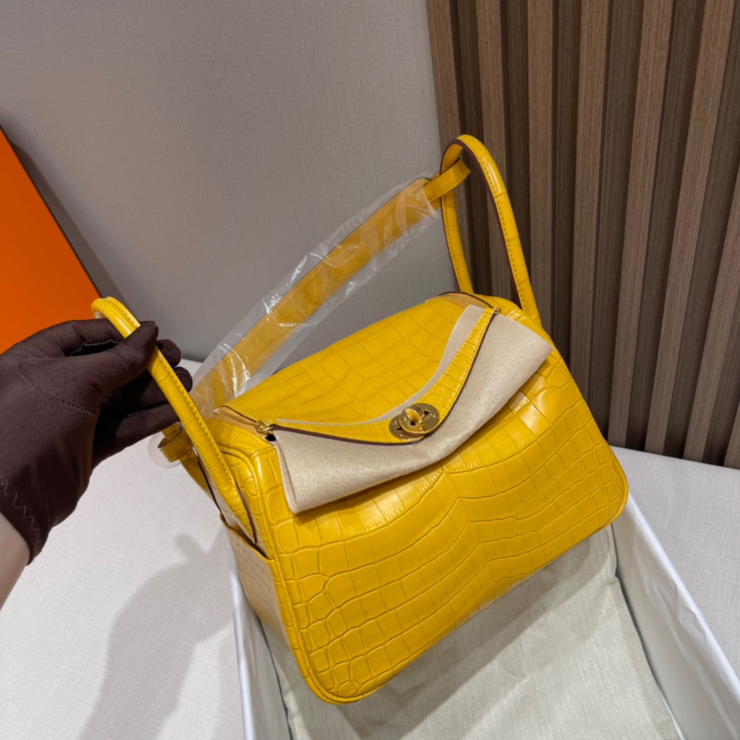 fb638e_0832da8573a742b79cf5f8b43905af4emv2.jpg Lindy 26 Crocodile Niloticus Matte Amber Yellow - Image 1