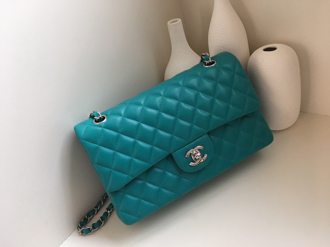 fb638e_0976bcbb08094ce4a82b5741c734bc09mv2.jpg Chanel Classic Flap 25 Lake Blue - Image 1