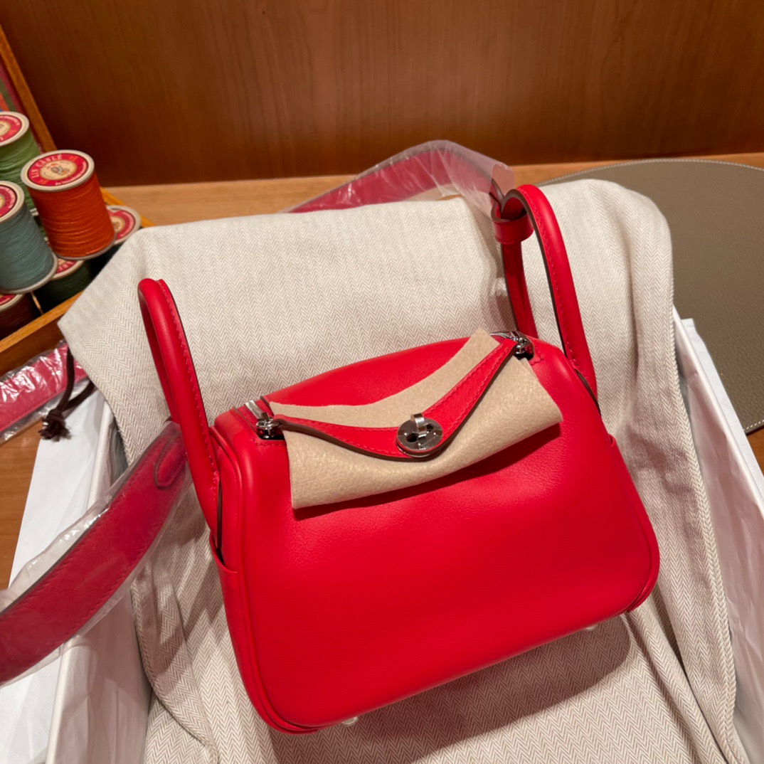 fb638e_0dcda6628e2a4637ba496855047315famv2.jpg Mini Lindy Swift Rouge de Coeur - Image 1