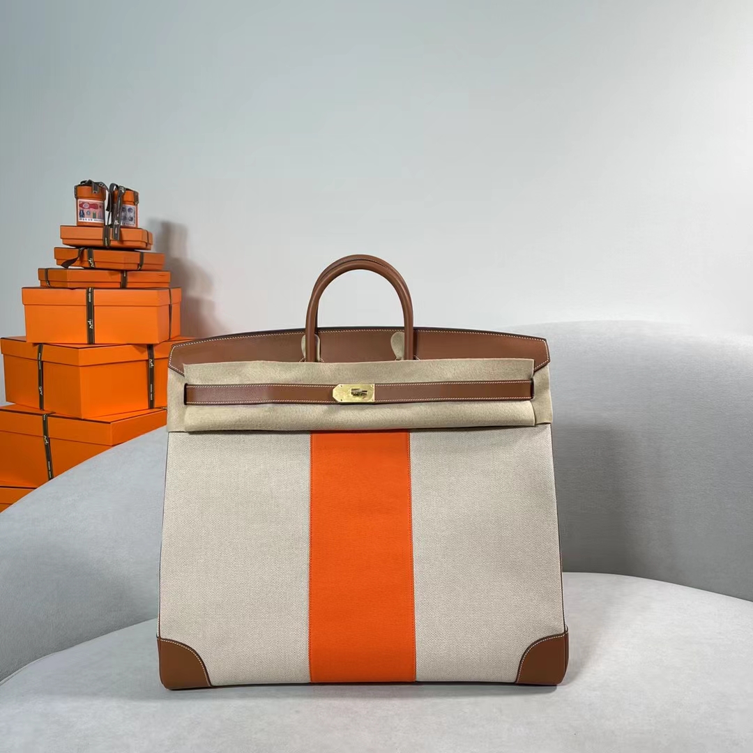 fb638e_0f6c4b3d40874df3a5ad34570f3ae7e9mv2.jpg Birkin Hac 50 Swift&Canvas Brown - Image 1