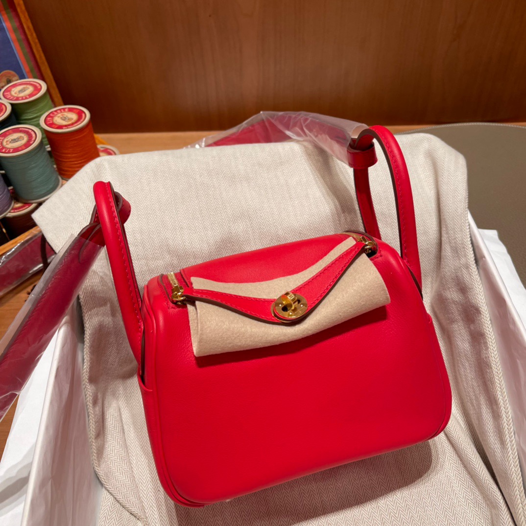 fb638e_120341810db6457aa4582215ddf7d863mv2.jpg Mini Lindy Swift Rouge de Coeur - Image 1